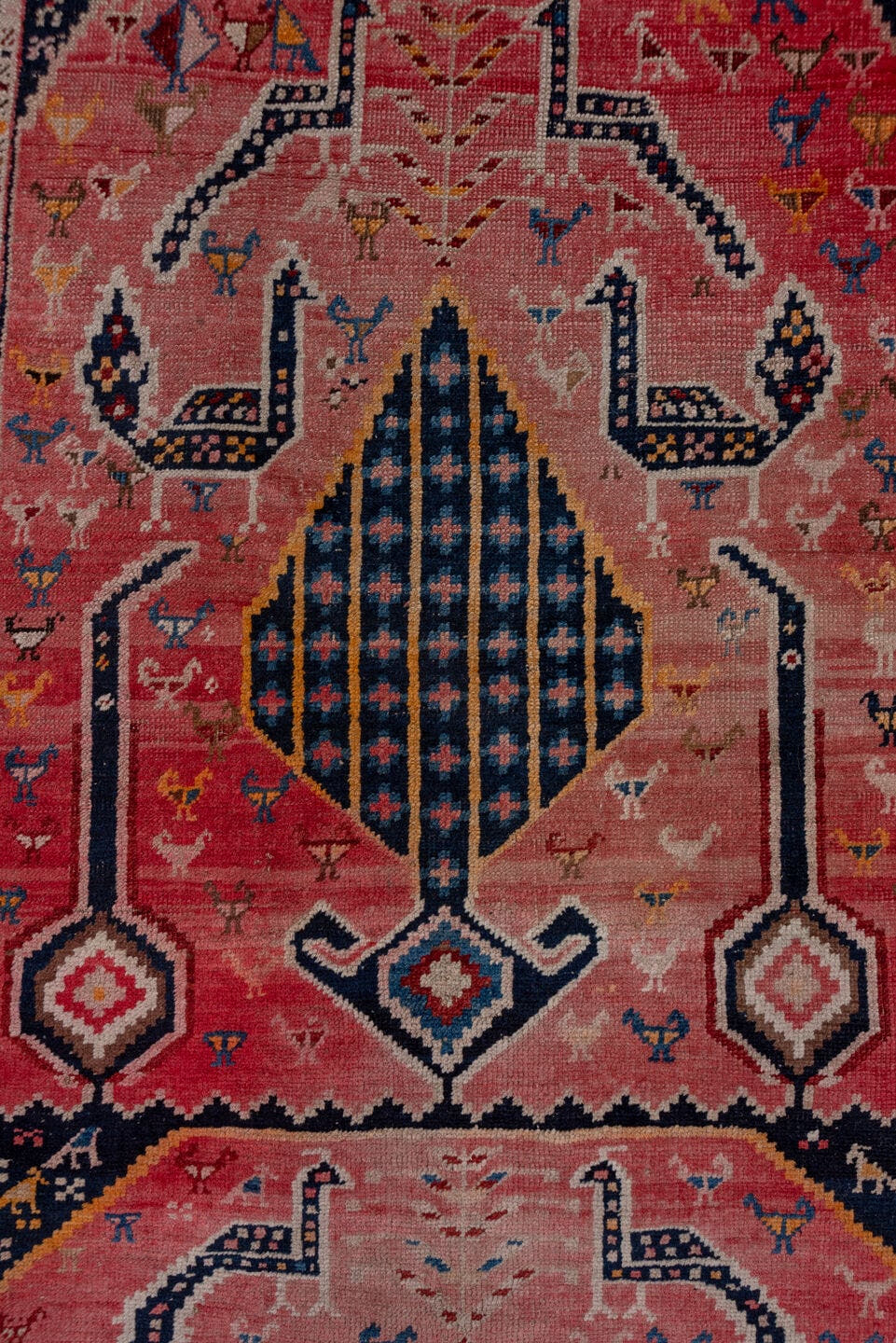 3' x 8' one-of-a-kind handmade antique Karabagh runner rug. Color palette: rose, indigo, crimson, ivory, navy, gold, coral