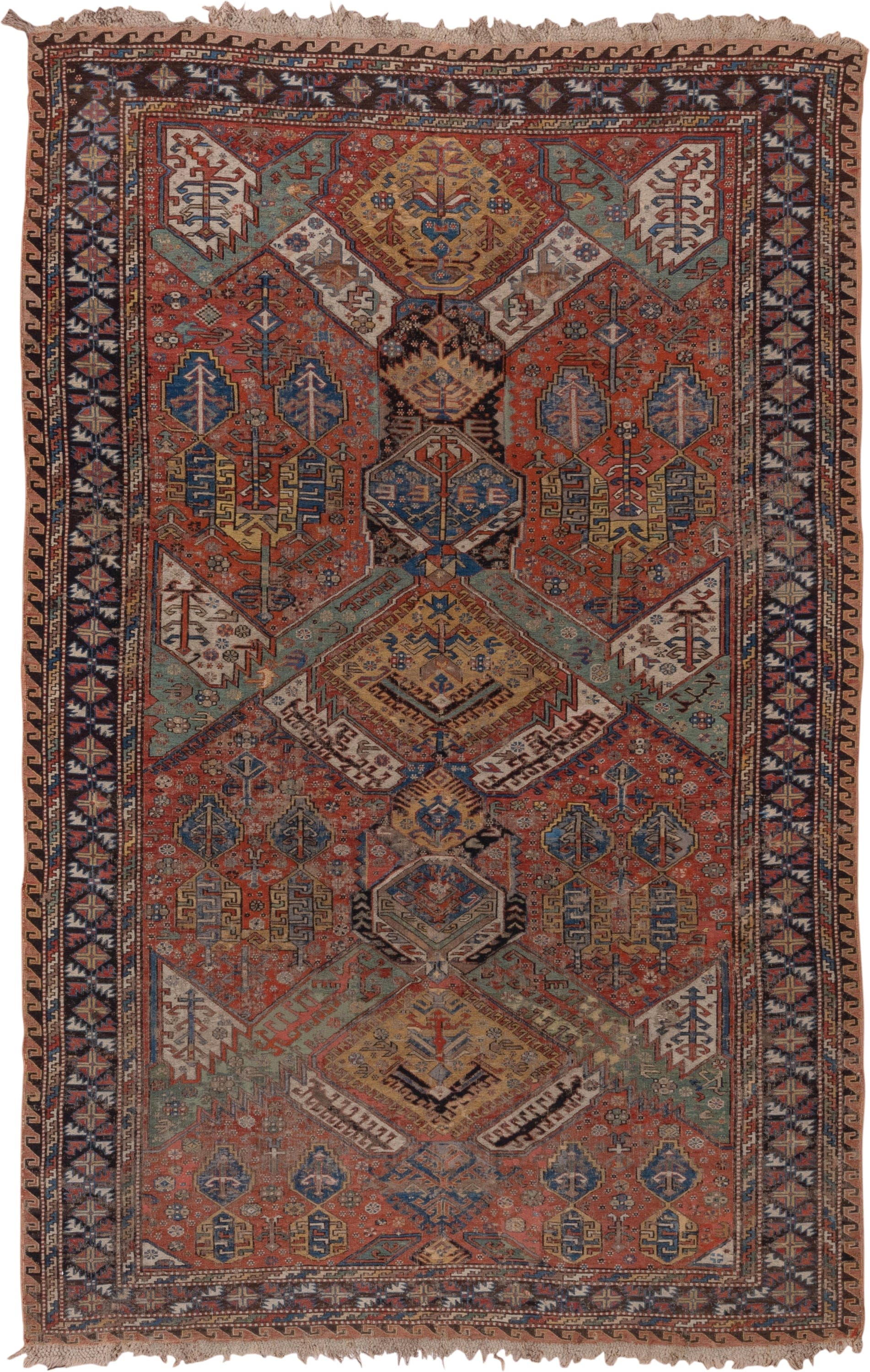 6' x 10' one-of-a-kind handmade antique Sumak large size rug. Color palette: rust, indigo, ivory, camel, aqua, charcoal