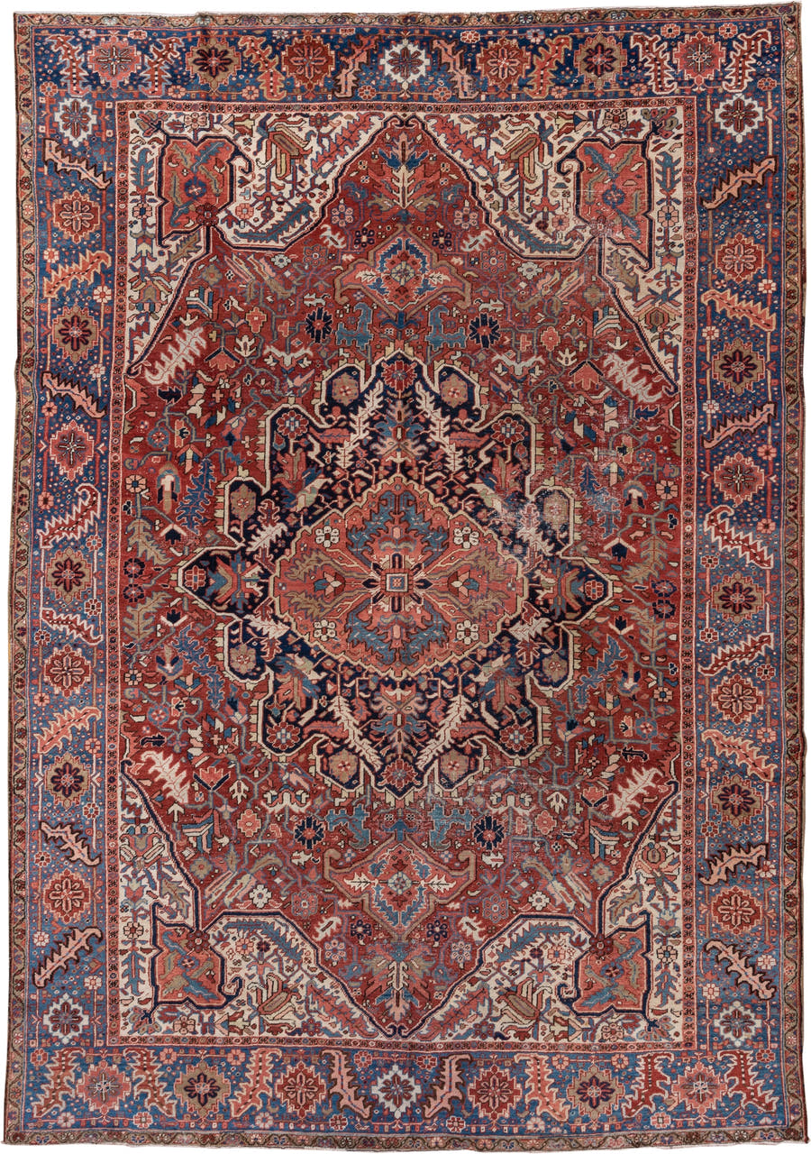 8' x 12' one-of-a-kind handmade antique Heriz large size rug. Color palette: rust, blue, ivory, navy, terra cotta, slate