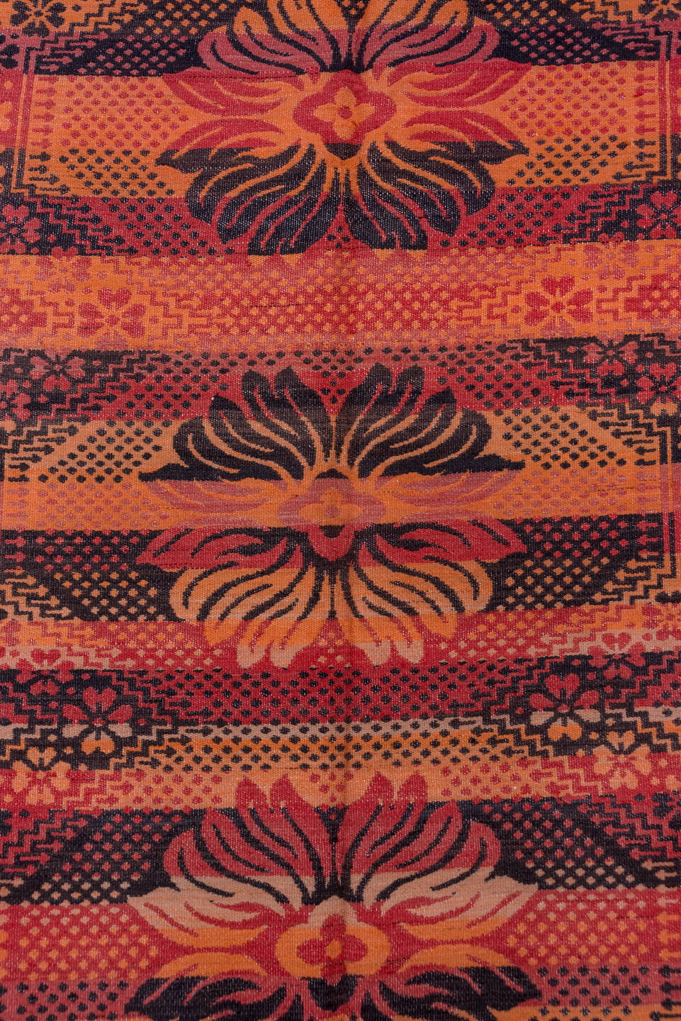 5' x 11' one-of-a-kind handmade antique Kilim rug. Color palette: terra cotta, rust, coral, mahogany, burgundy, rose