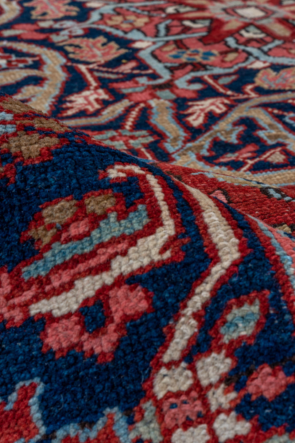7' x 10' one-of-a-kind handmade antique Heriz large size rug. Color palette: red, navy, ivory, sky blue, rose, burgundy