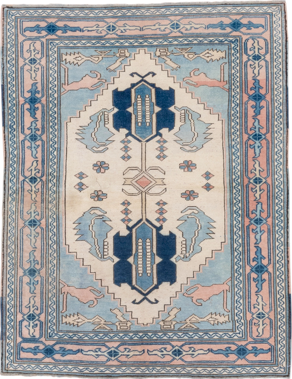 4' x 5' one-of-a-kind handmade vintage Oushak small size rug. Color palette: ivory, sky blue, blush, navy, taupe, light blue