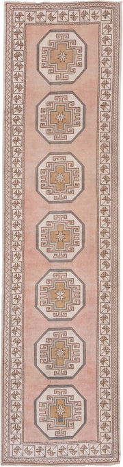 2' x 11' one-of-a-kind handmade vintage Oushak runner rug. Color palette: blush, ivory, taupe, camel, beige, soft gold, pink