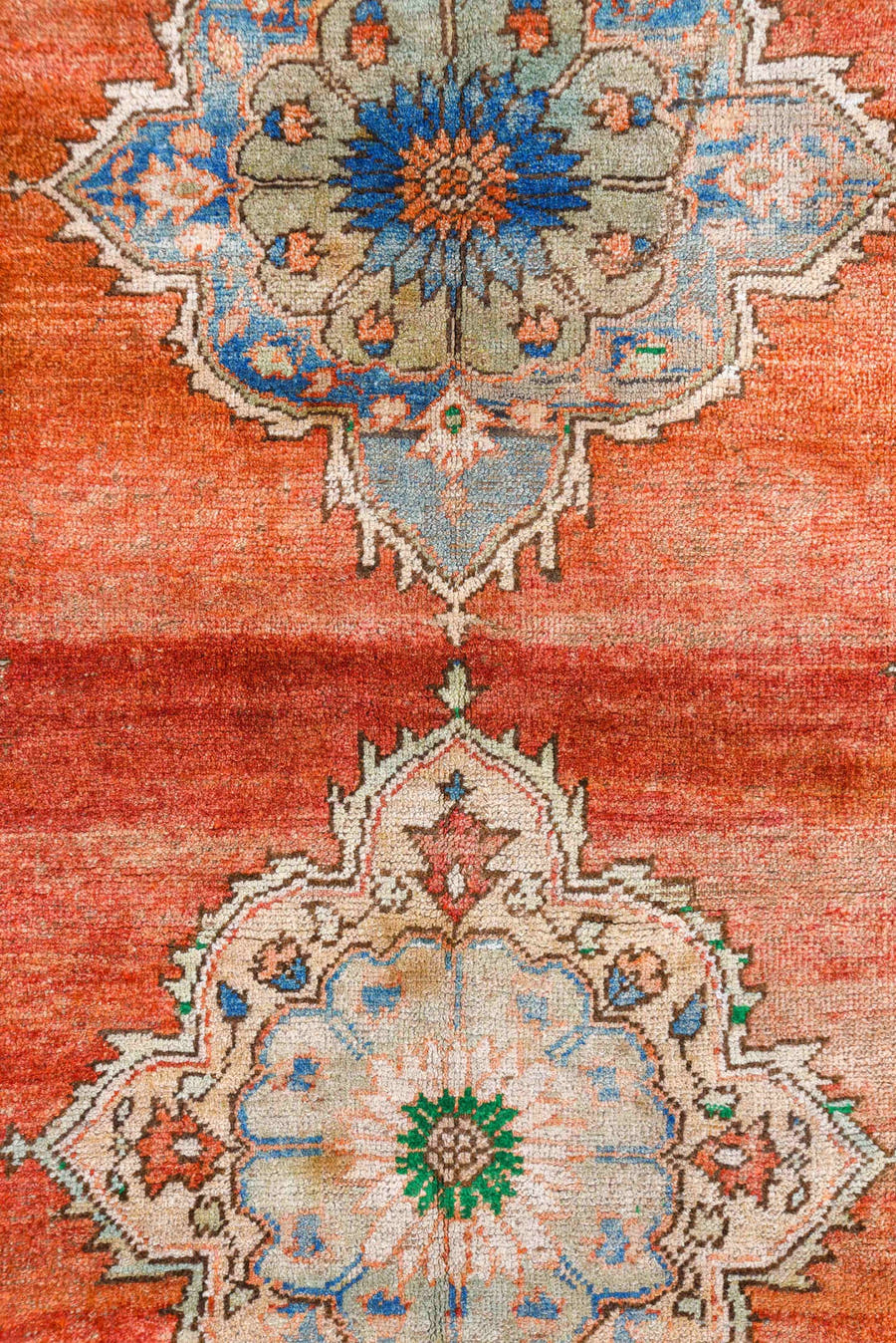 7' x 8' one-of-a-kind handmade vintage Oushak rug. Color palette: terra cotta, ivory, blue, sky blue, gray, rust, green