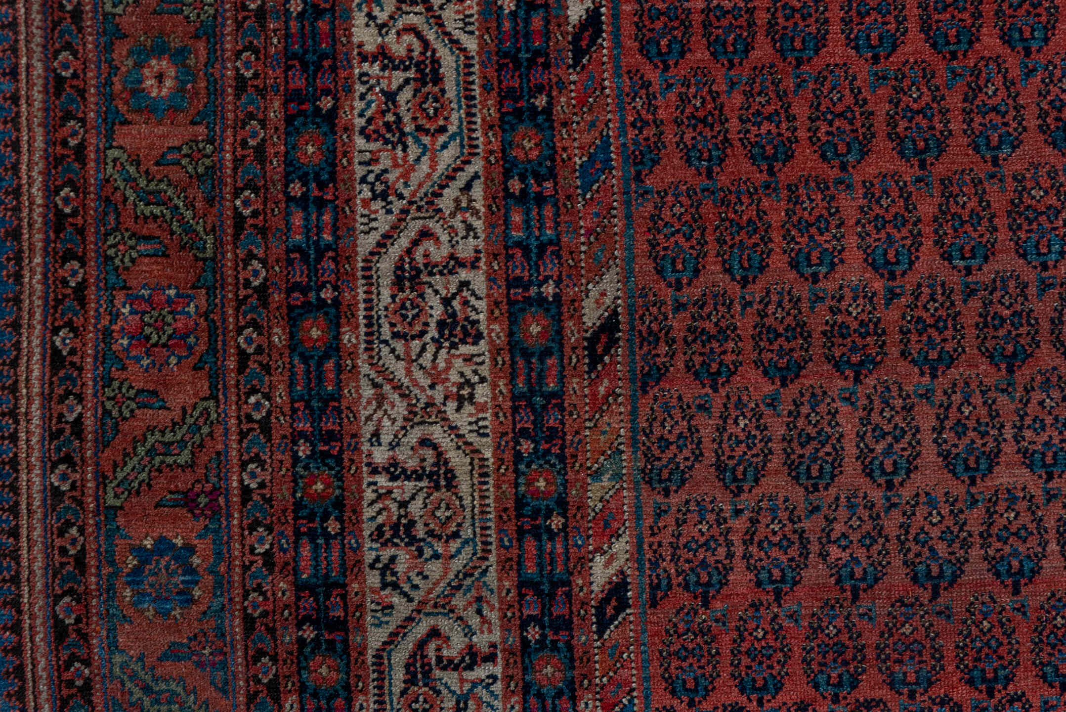 7' x 15' one-of-a-kind handmade antique Saraband rug. Color palette: rust, navy, ivory, terra cotta, charcoal, camel