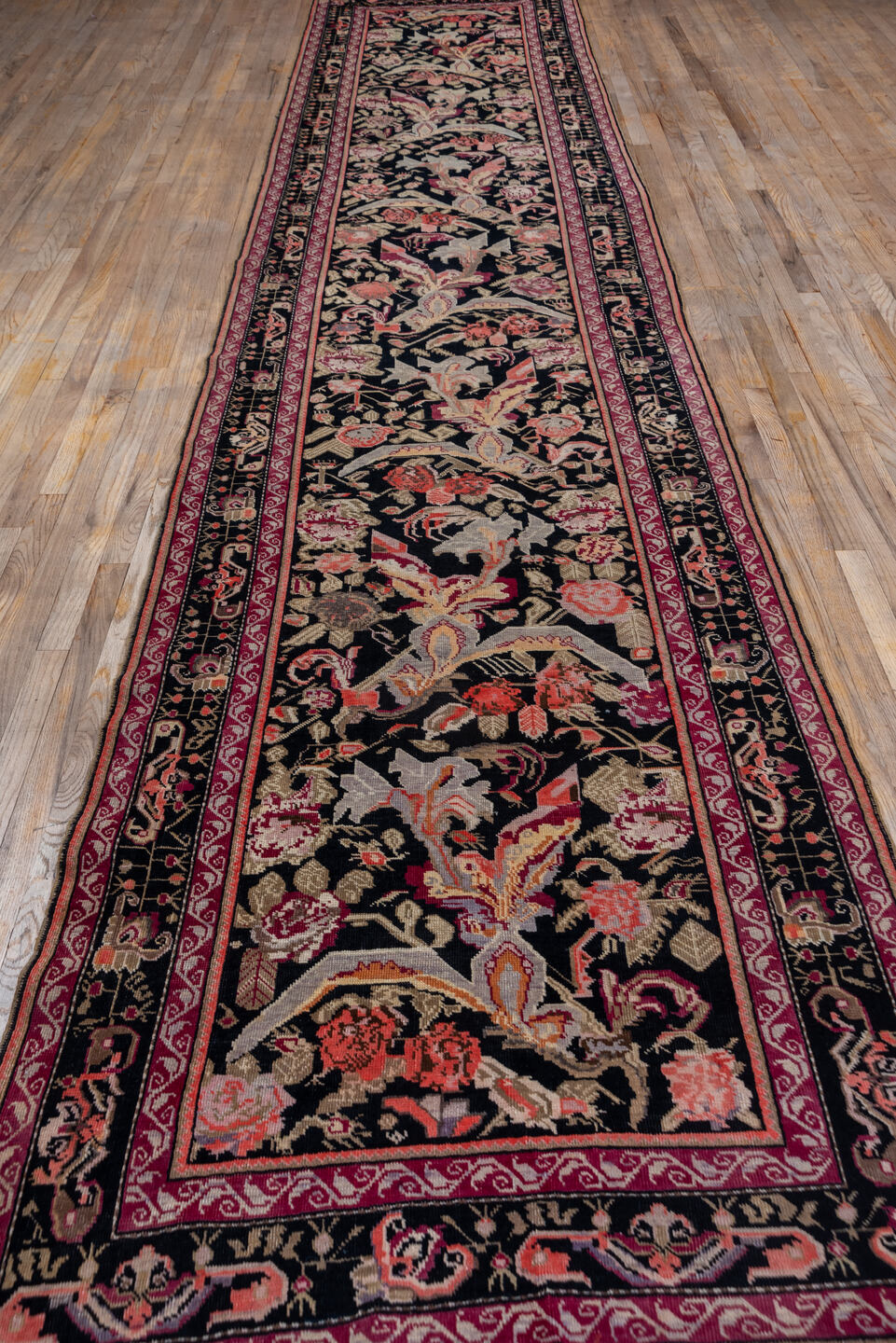 3' x 18' one-of-a-kind handmade vintage Karabagh runner rug. Color palette: black, brown, off-white, orange, pink, red
