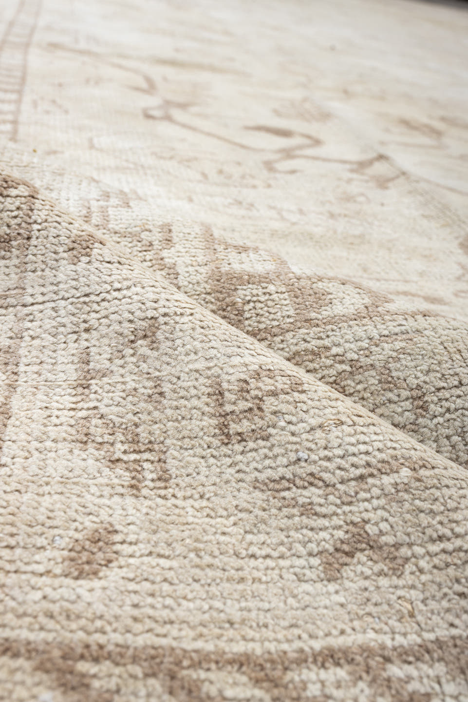 14' x 17' one-of-a-kind handmade antique Oushak oversize rug. Color palette: ivory, taupe, camel, brown, pale blue, beige
