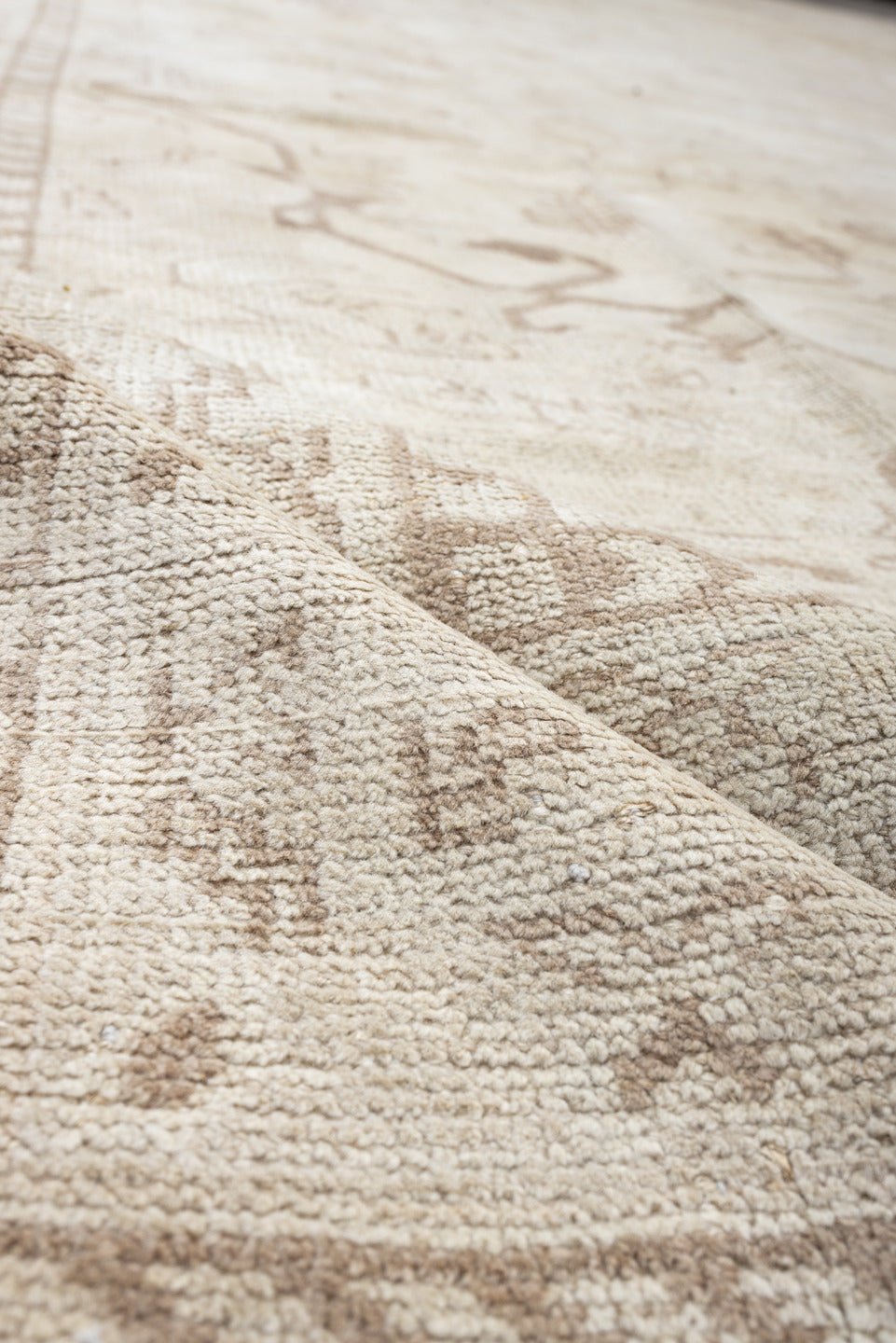14' x 17' one-of-a-kind handmade antique Oushak oversize rug. Color palette: ivory, taupe, camel, brown, pale blue, beige