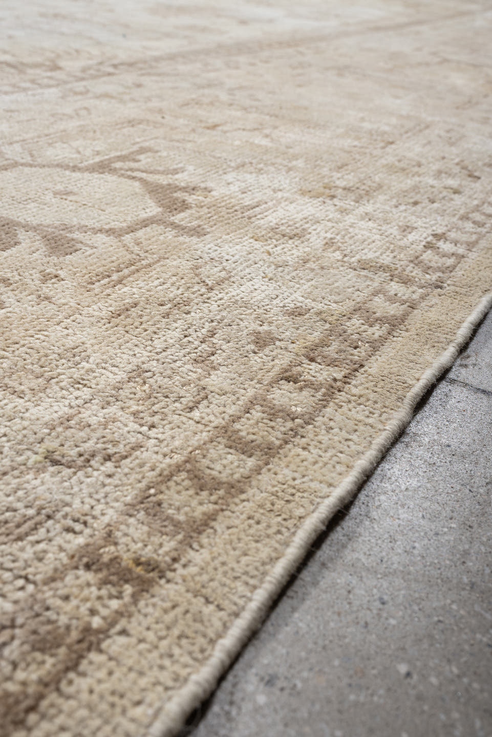 14' x 17' one-of-a-kind handmade antique Oushak oversize rug. Color palette: ivory, taupe, camel, brown, pale blue, beige