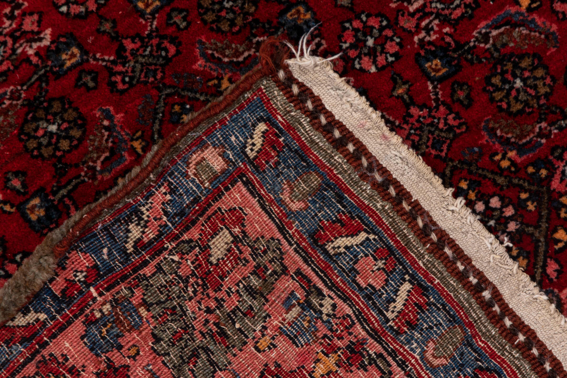 5' x 7' one-of-a-kind handmade antique Bidjar rug. Color palette: red, navy, rust, rose, ivory, charcoal, blue, terracotta