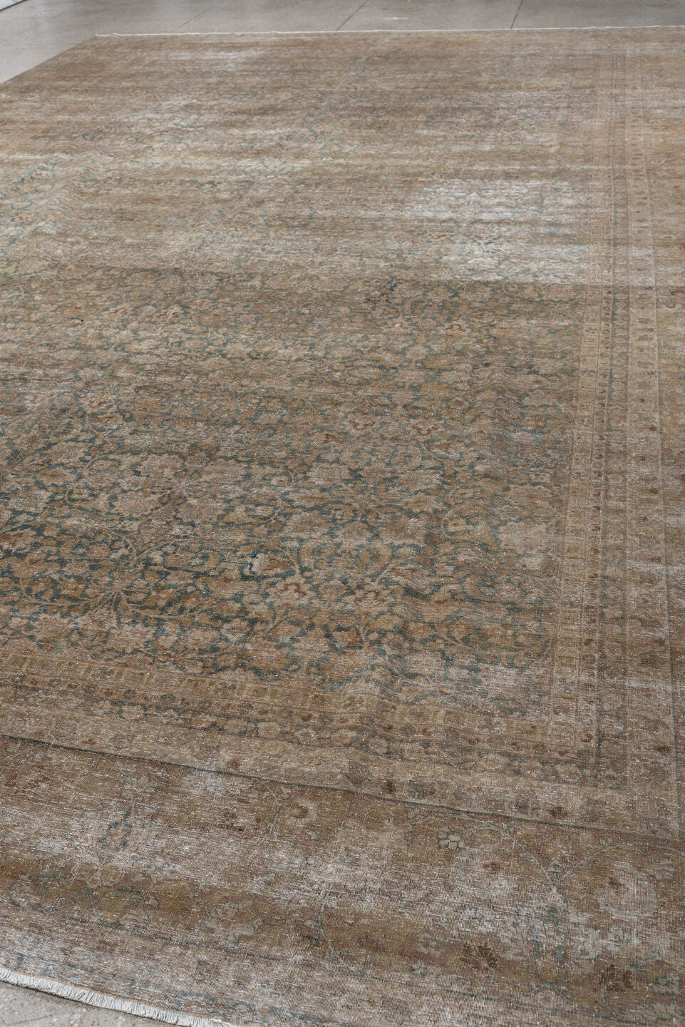 11' x 16' one-of-a-kind handmade antique Tabriz oversize rug. Color palette: taupe, faded blue, beige, ivory, camel, slate