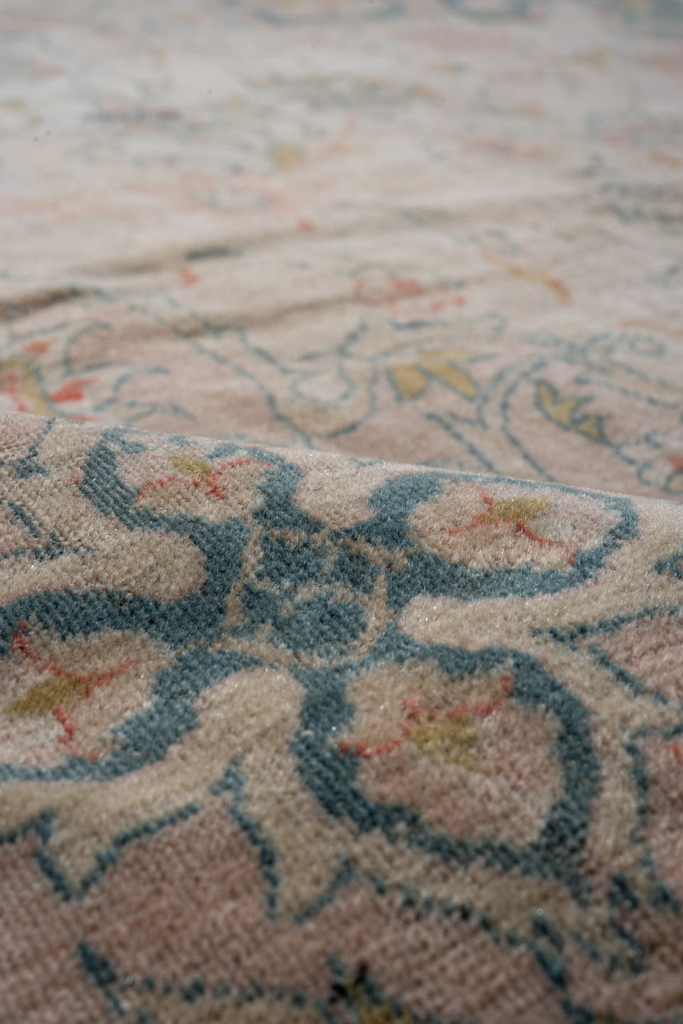 8' x 11' one-of-a-kind handmade antique Sivas large size rug. Color palette: ivory, peach, muted blue, sage, taupe, gold