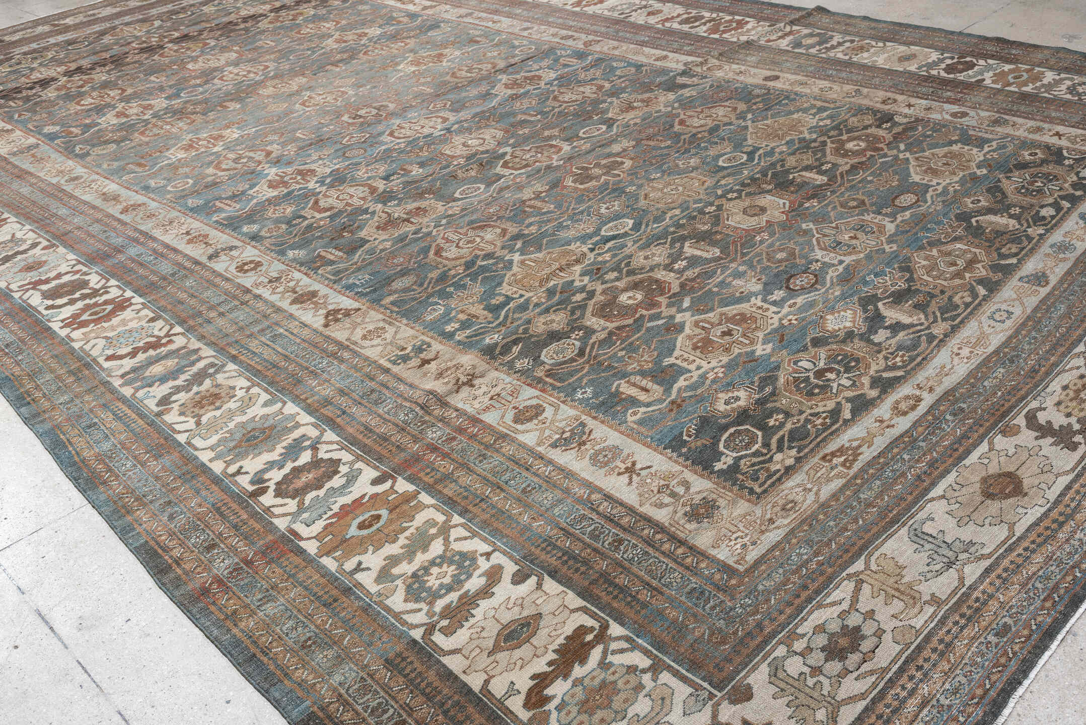 12' x 20' one-of-a-kind handmade antique Malayer oversize rug. Color palette: blue, ivory, taupe, rust, charcoal, camel