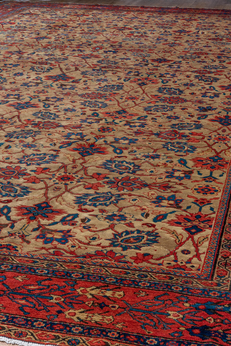 12' x 19' one-of-a-kind handmade antique Sultanabad oversize rug. Color palette: camel, rust, indigo, ivory, crimson, navy
