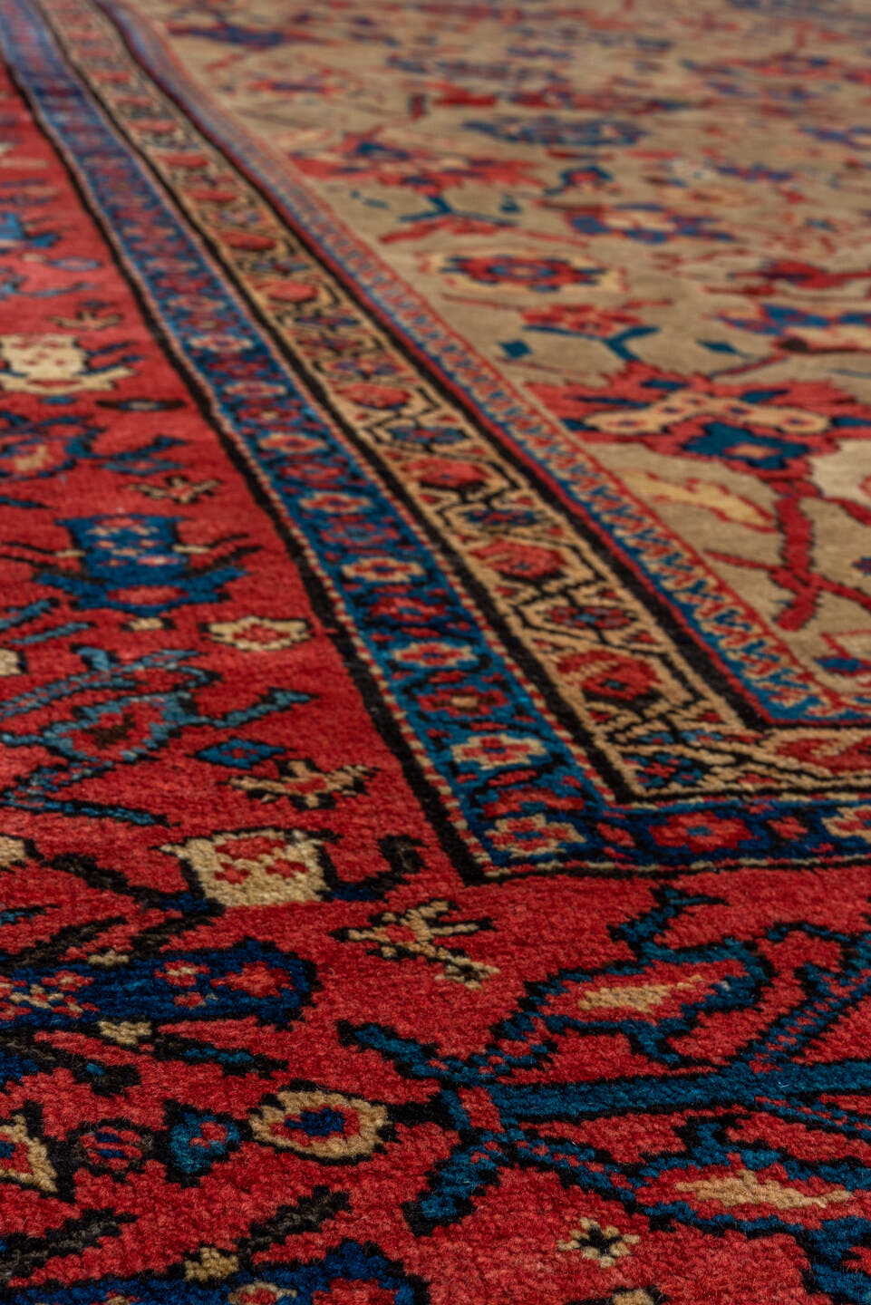 12' x 19' one-of-a-kind handmade antique Sultanabad oversize rug. Color palette: camel, rust, indigo, ivory, crimson, navy