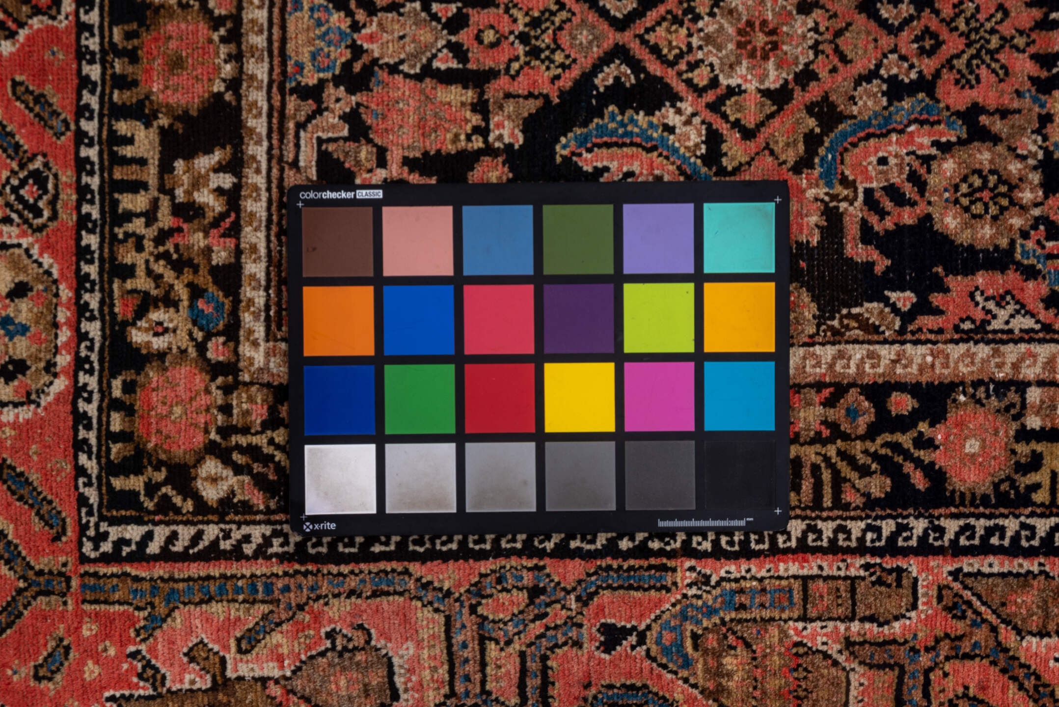 4' x 10' one-of-a-kind handmade vintage Malayer runner rug. Color palette: black, blue, brown, charcoal, gray, pink, red