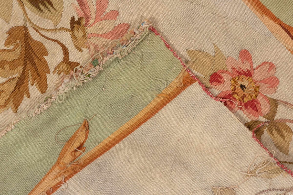 2' x 7' one-of-a-kind handmade antique Aubusson runner rug. Color palette: sage, ivory, rose, coral, gold, taupe, lavender