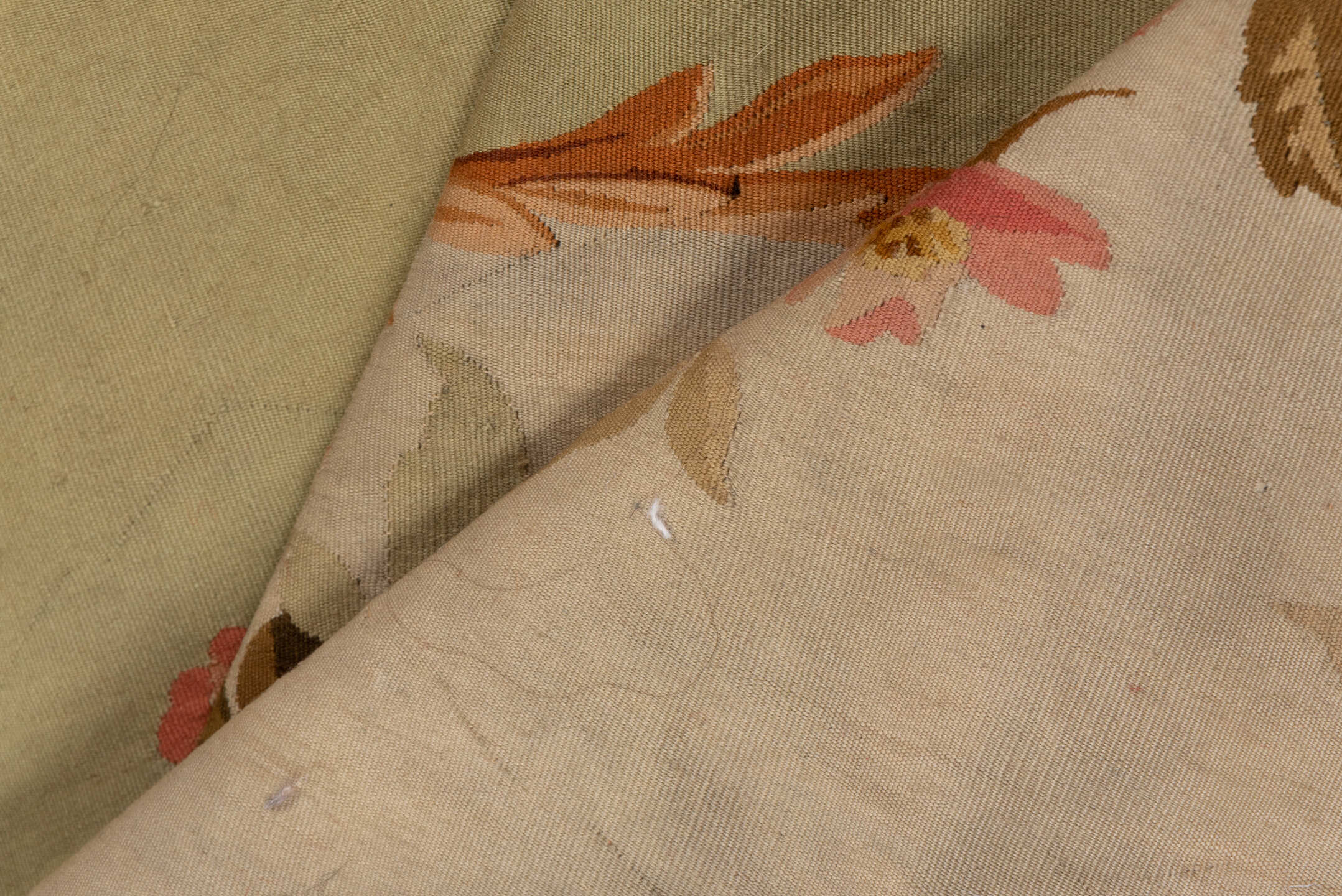 2' x 7' one-of-a-kind handmade antique Aubusson runner rug. Color palette: sage, ivory, rose, coral, gold, taupe, lavender