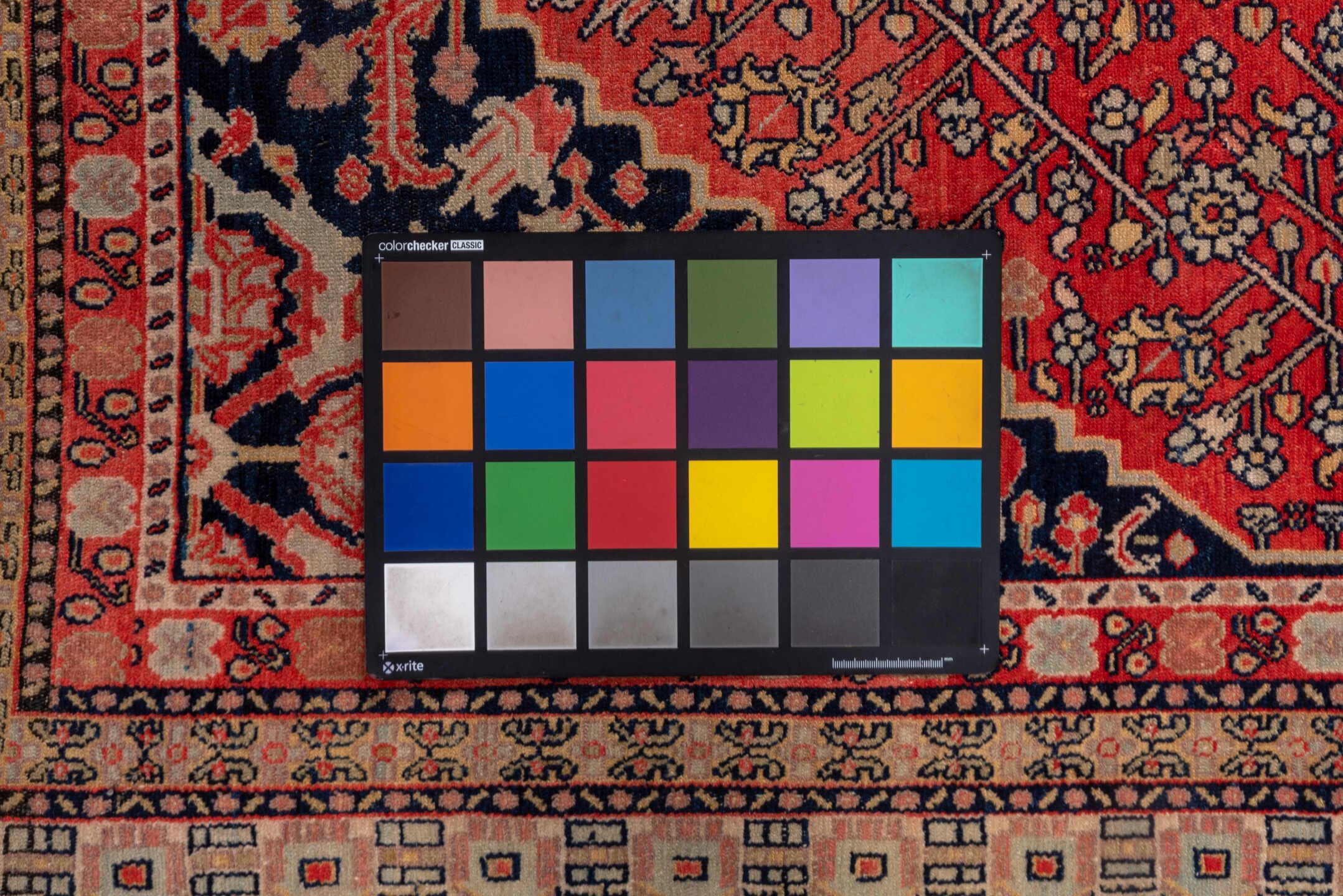 5' x 7' one-of-a-kind handmade antique Senne rug. Color palette: brick red, navy, ivory, rust, camel, charcoal, rose, taupe