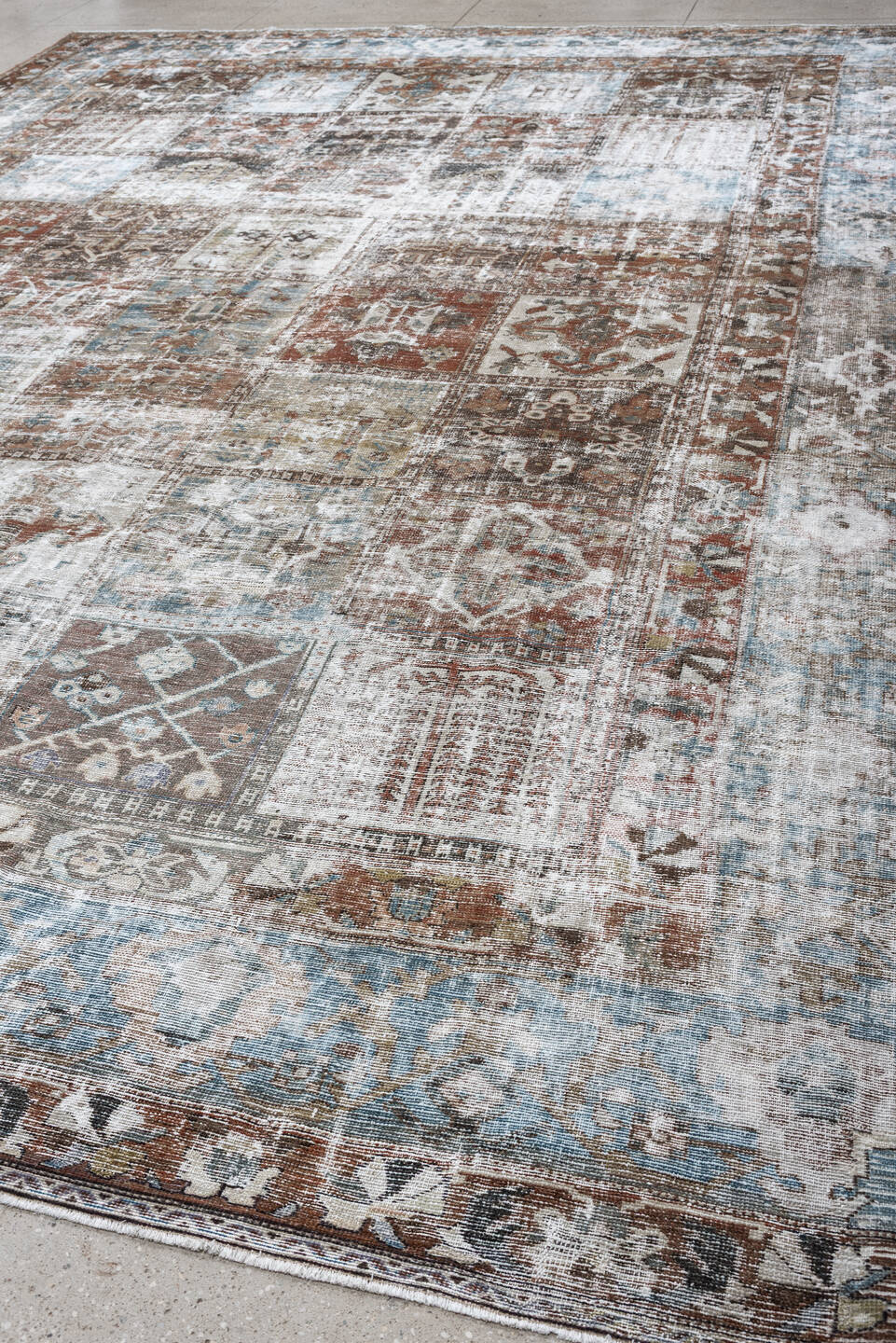 12' x 15' one-of-a-kind handmade antique Baktiary oversize rug. Color palette: sky blue, terracotta, ivory, taupe, slate