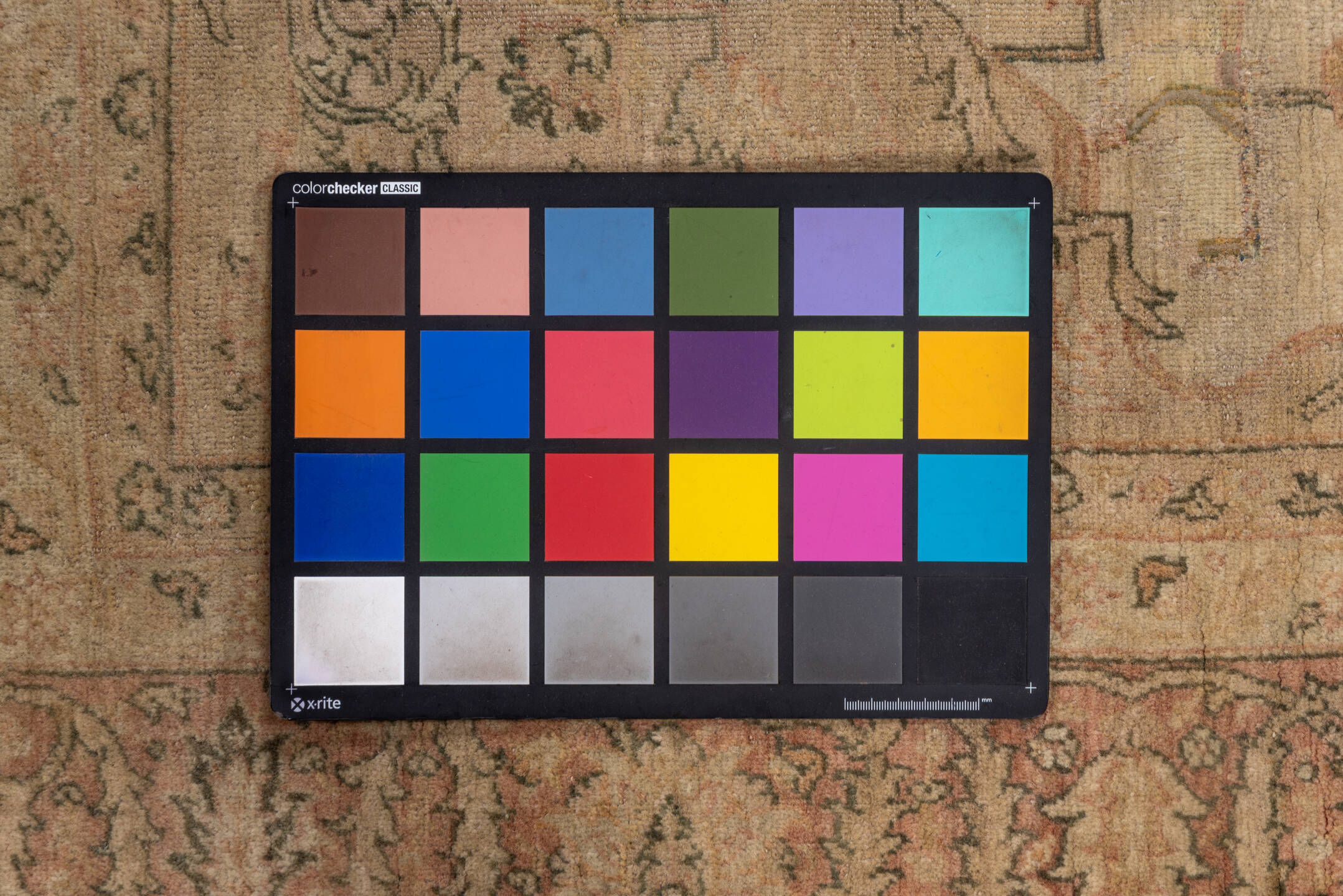 5' x 8' one-of-a-kind handmade vintage Sivas medium size rug. Color palette: brown, gray, light gray, off-white, orange