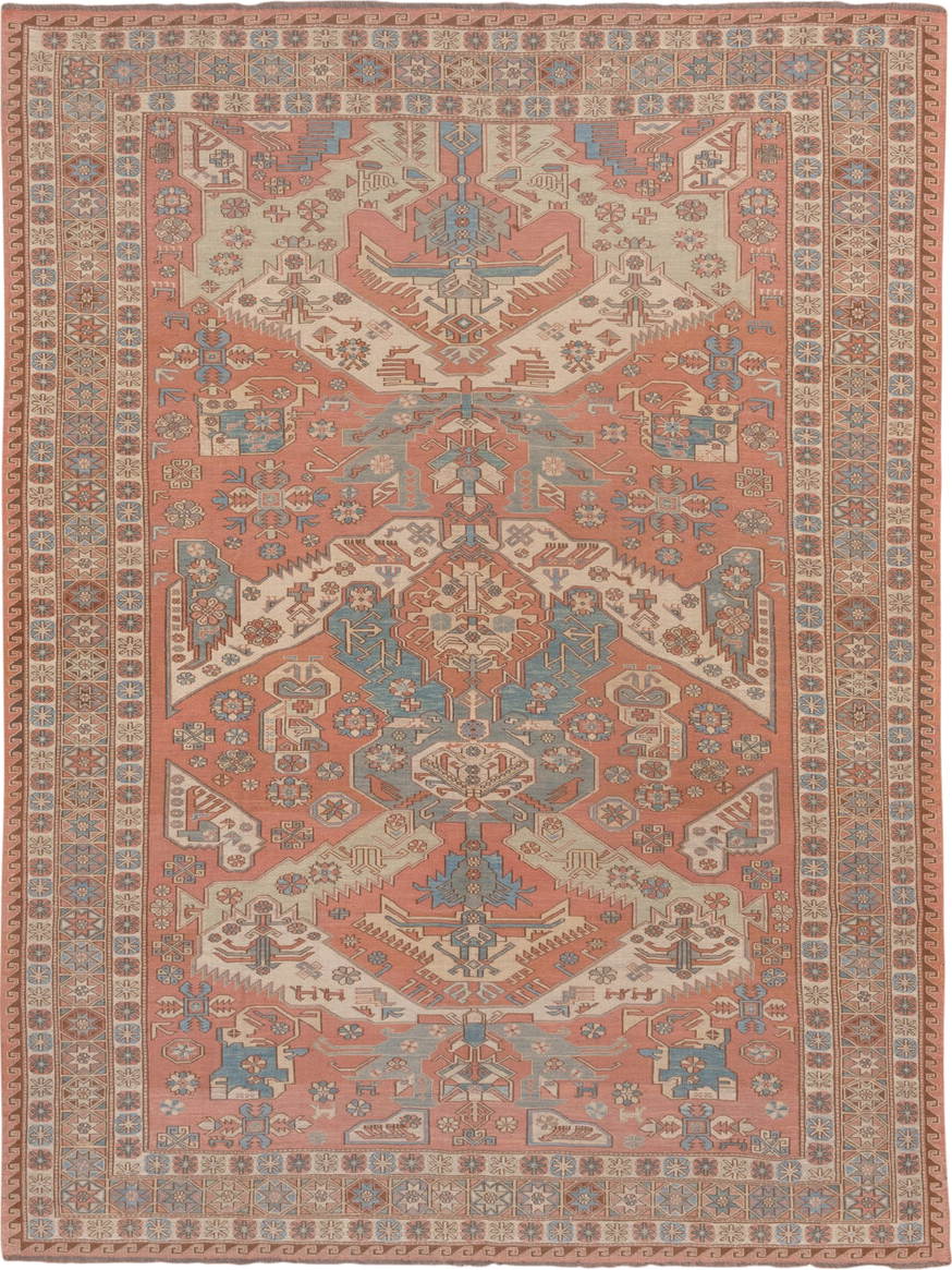 7' x 9' one-of-a-kind handmade vintage Sumak rug. Color palette: salmon, ivory, dusty blue, taupe, rust, beige, pink, blue