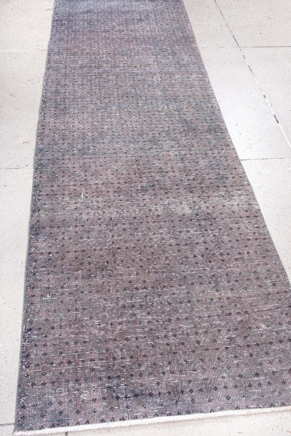 2' x 8' one-of-a-kind handmade vintage Overdyed runner rug. Color palette: lavender, gray, taupe, charcoal, ivory