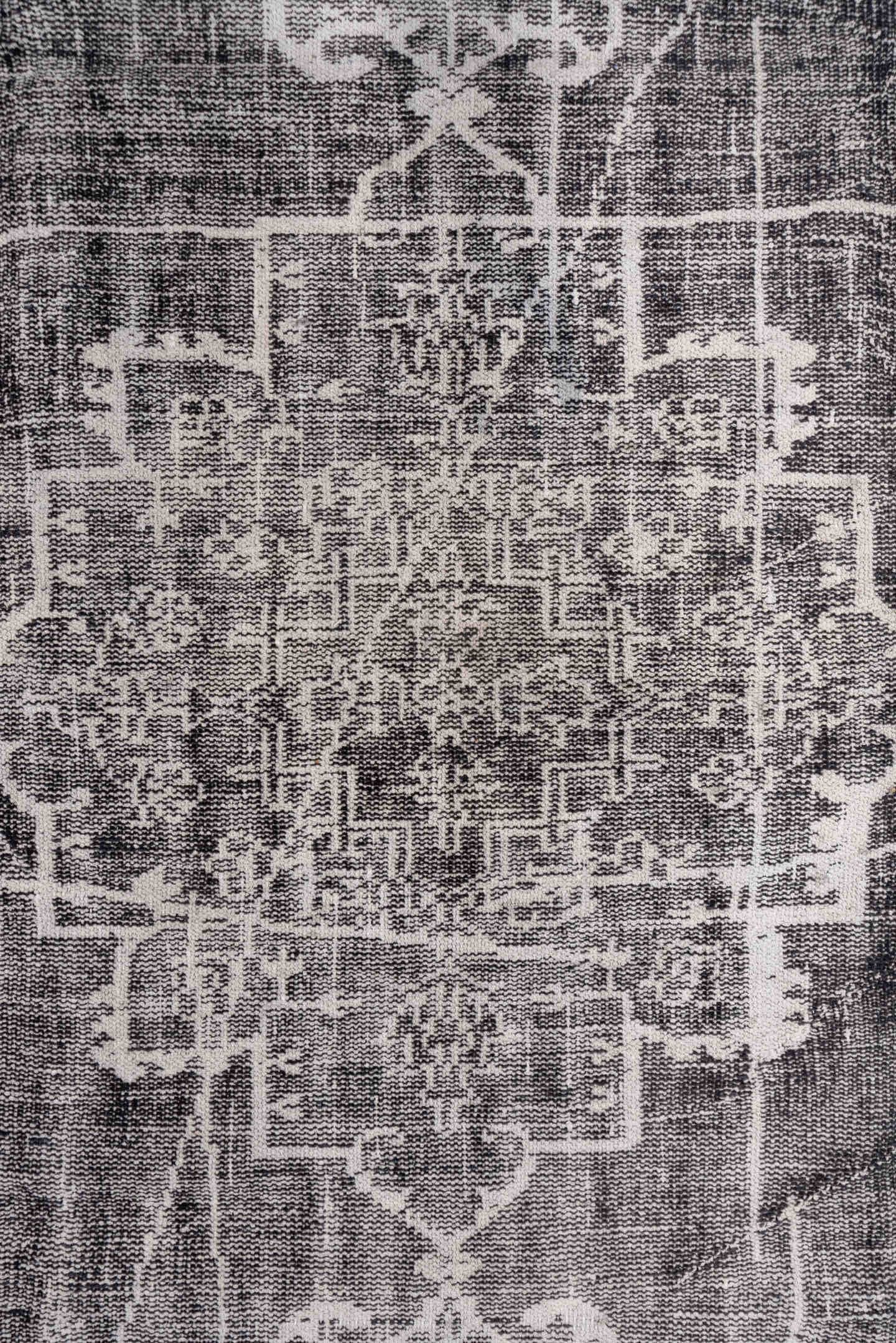 7' x 9' one-of-a-kind handmade vintage Overdyed rug. Color palette: charcoal, ivory, taupe, slate, gray, black, beige