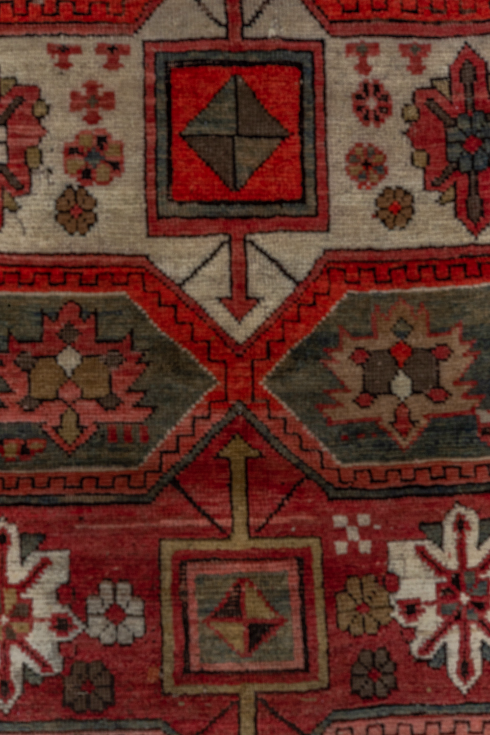 3' x 8' one-of-a-kind handmade vintage Kazak runner rug. Color palette: red, ivory, brown, blue, charcoal, rust, rose, taupe