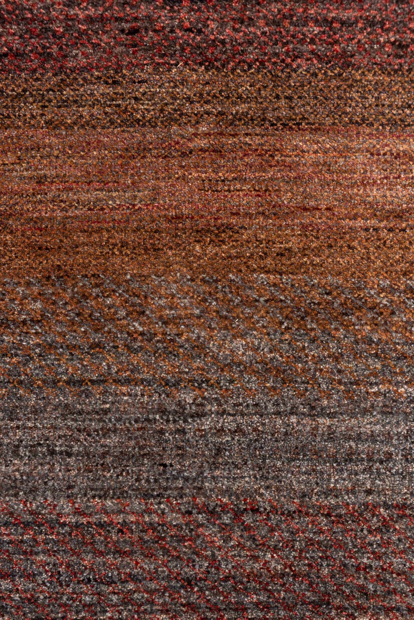 2' x 10' one-of-a-kind handmade vintage Gabbe runner rug. Color palette: rust, brown, taupe, brick, charcoal, terra cotta