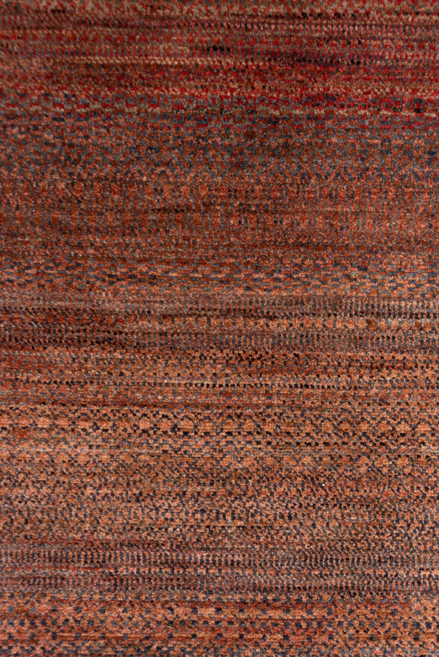 2' x 10' one-of-a-kind handmade vintage Gabbe runner rug. Color palette: rust, brown, terra cotta, mahogany, taupe, charcoal