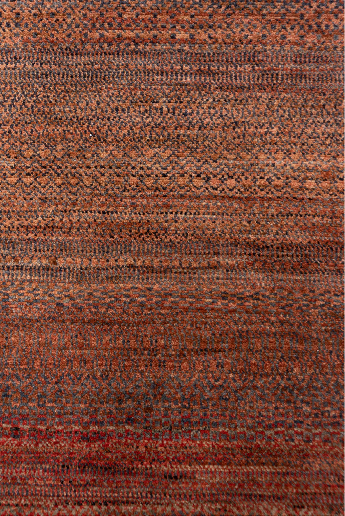 2' x 10' one-of-a-kind handmade vintage Gabbe runner rug. Color palette: brown, off-white, pink, red, redwood, snow, white