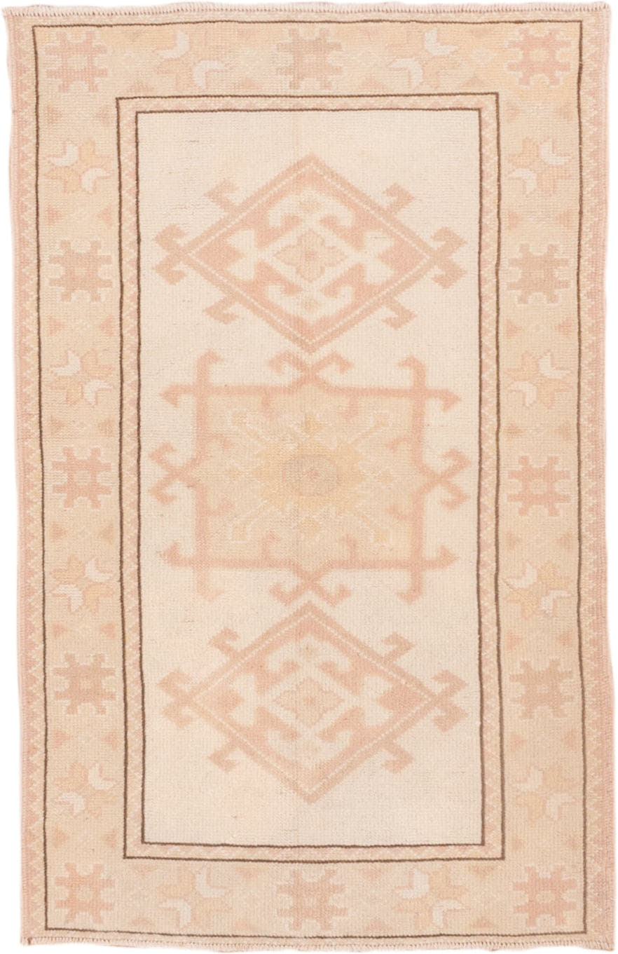 2' x 4' one-of-a-kind handmade vintage Oushak small size rug. Color palette: ivory, blush, peach, taupe, camel, pink