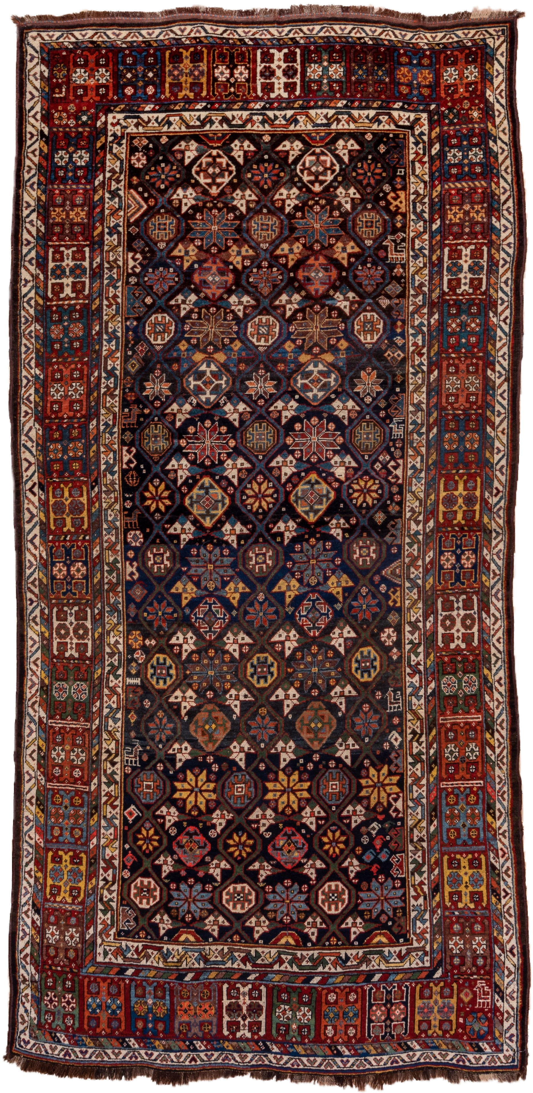 5' x 11' one-of-a-kind handmade vintage Baktiary rug. Color palette: navy, rust, ivory, indigo, gold, terra cotta, brown