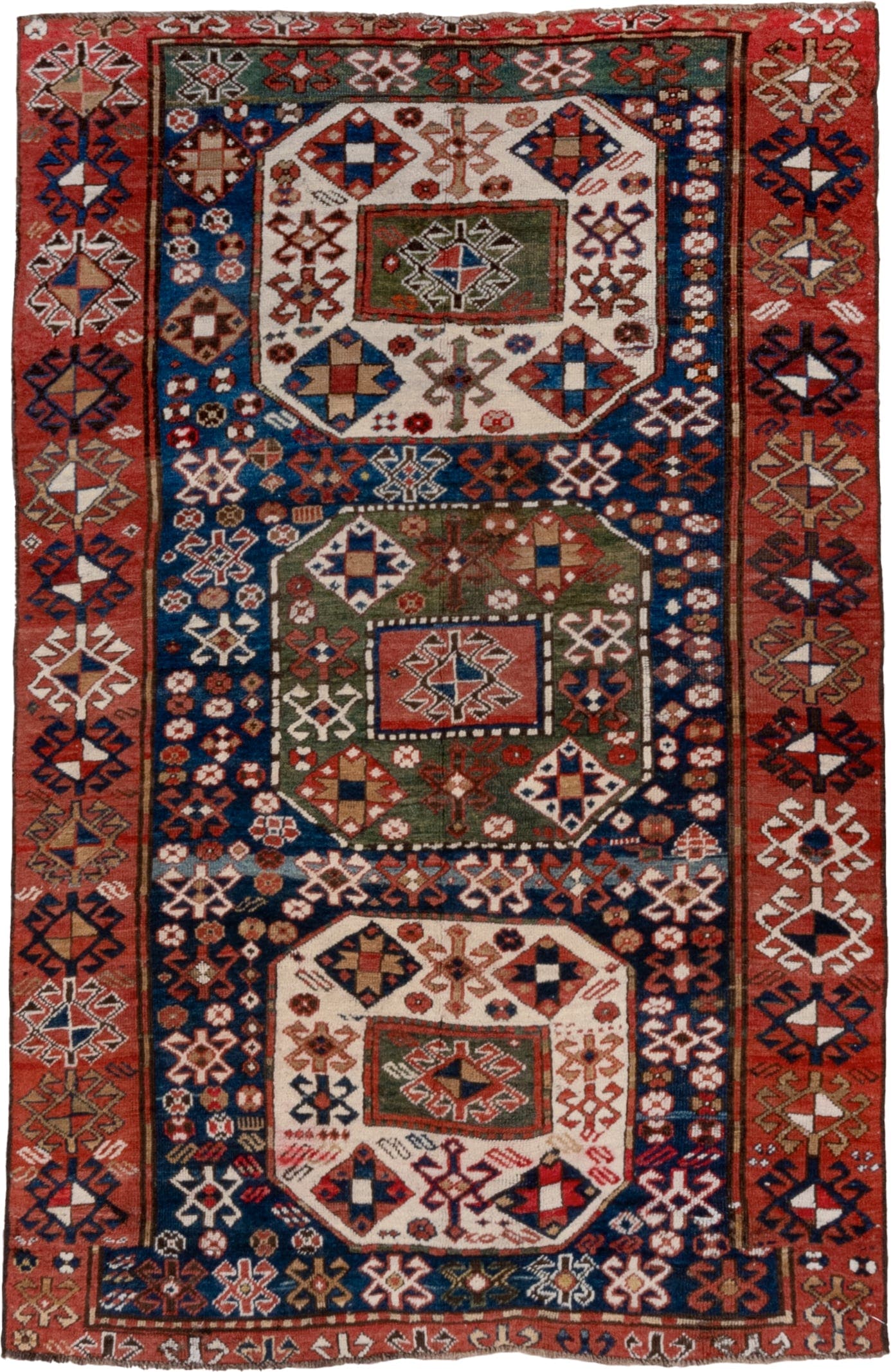 4' x 6' one-of-a-kind handmade vintage Kazak small size rug. Color palette: navy, rust, ivory, olive, crimson, camel