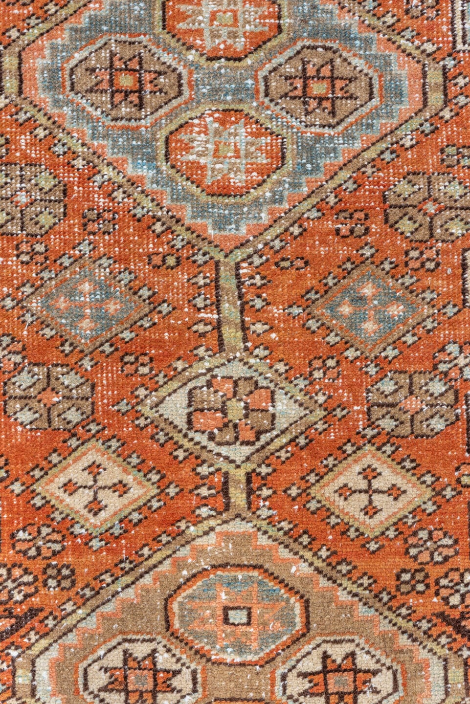 2' x 10' one-of-a-kind handmade vintage Heriz runner rug. Color palette: terra cotta, ivory, pale blue, taupe, rust, sage