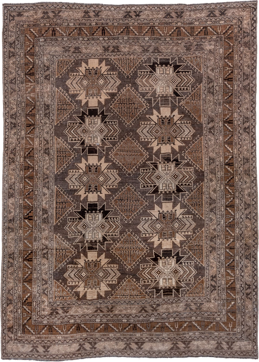 7' x 9' one-of-a-kind handmade vintage Afghan rug. Color palette: taupe, brown, ivory, charcoal, camel, beige, gray, black