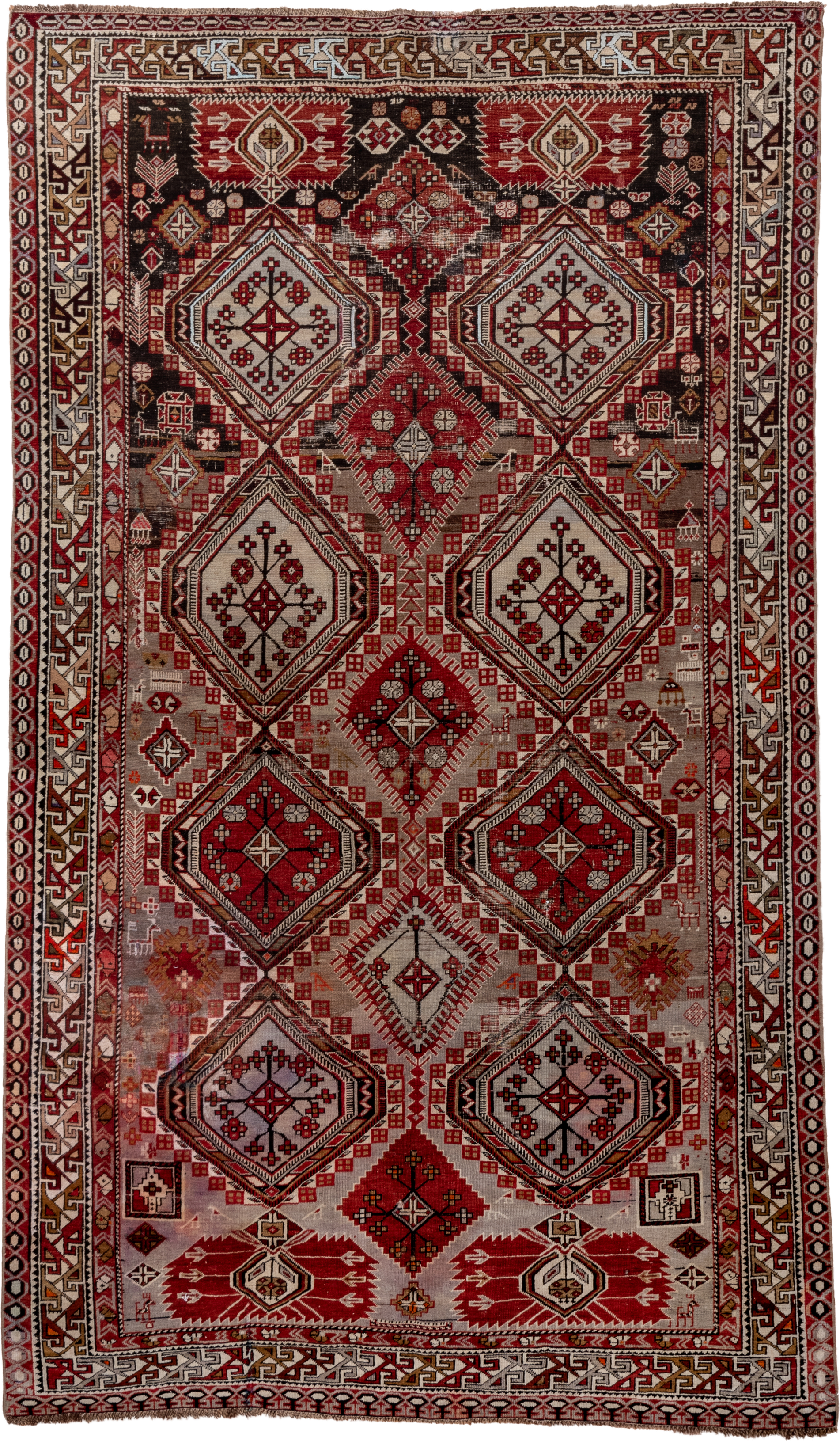 4' x 7' one-of-a-kind handmade vintage Shirvan rug. Color palette: ivory, crimson, charcoal, camel, taupe, mahogany, red