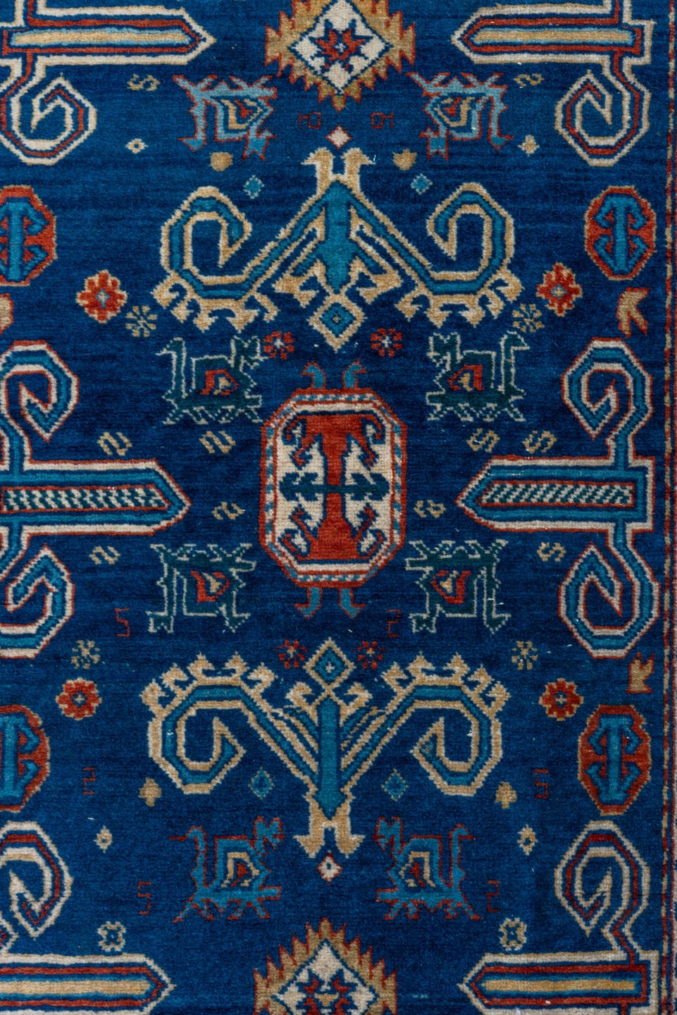 4' x 5' one-of-a-kind handmade vintage Shirvan small size rug. Color palette: navy, ivory, rust, sky_blue, crimson, camel