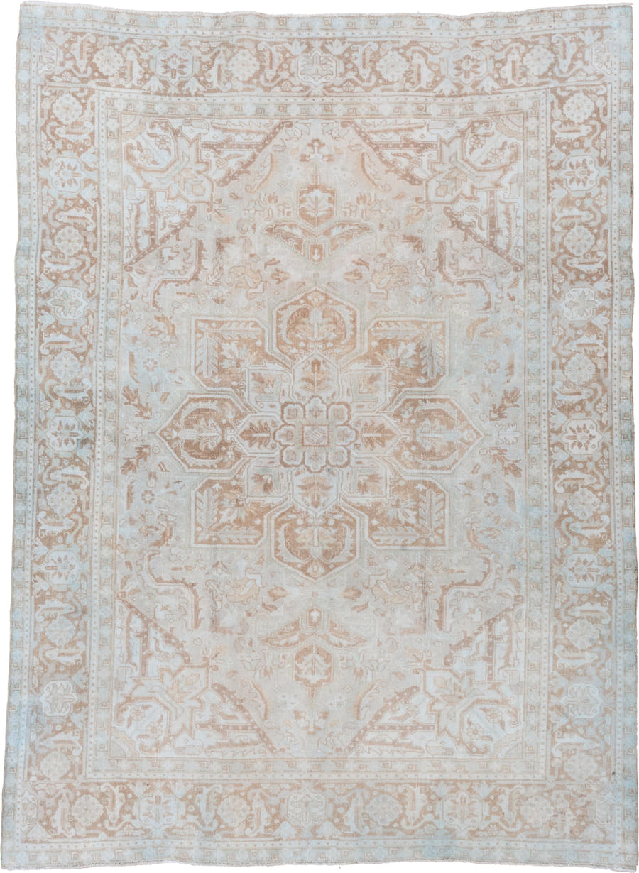 7' x 9' one-of-a-kind handmade vintage Heriz rug. Color palette: ivory, beige, taupe, camel, pale blue, gray, light blue