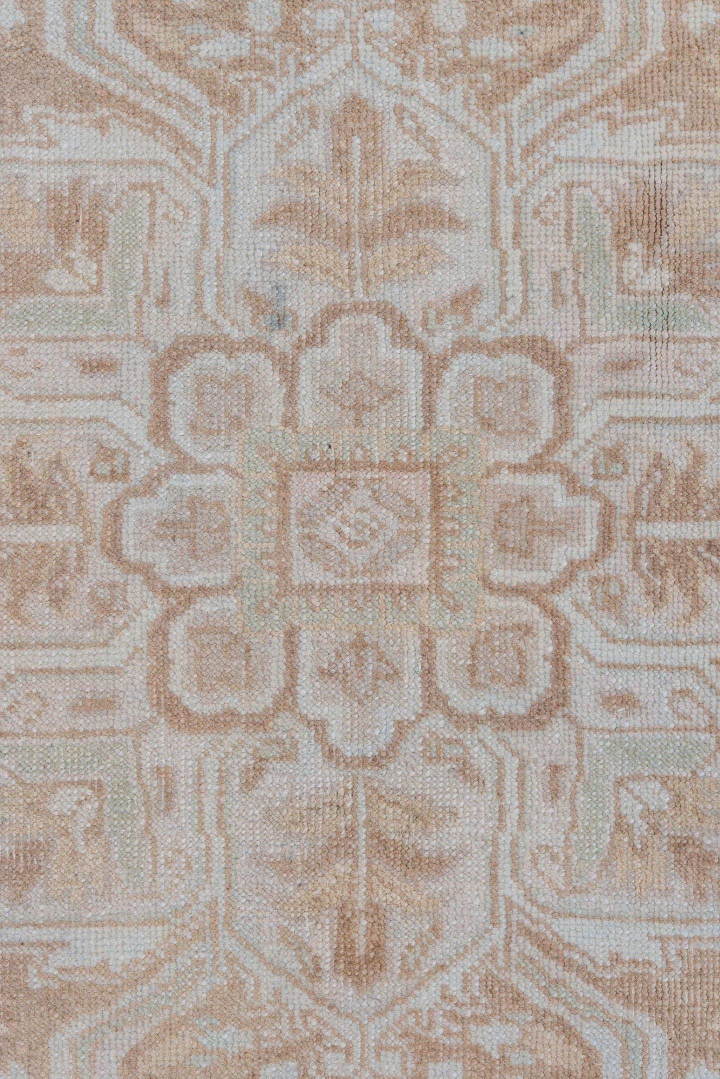 7' x 9' one-of-a-kind handmade vintage Heriz rug. Color palette: ivory, beige, taupe, camel, pale blue, gray, light blue
