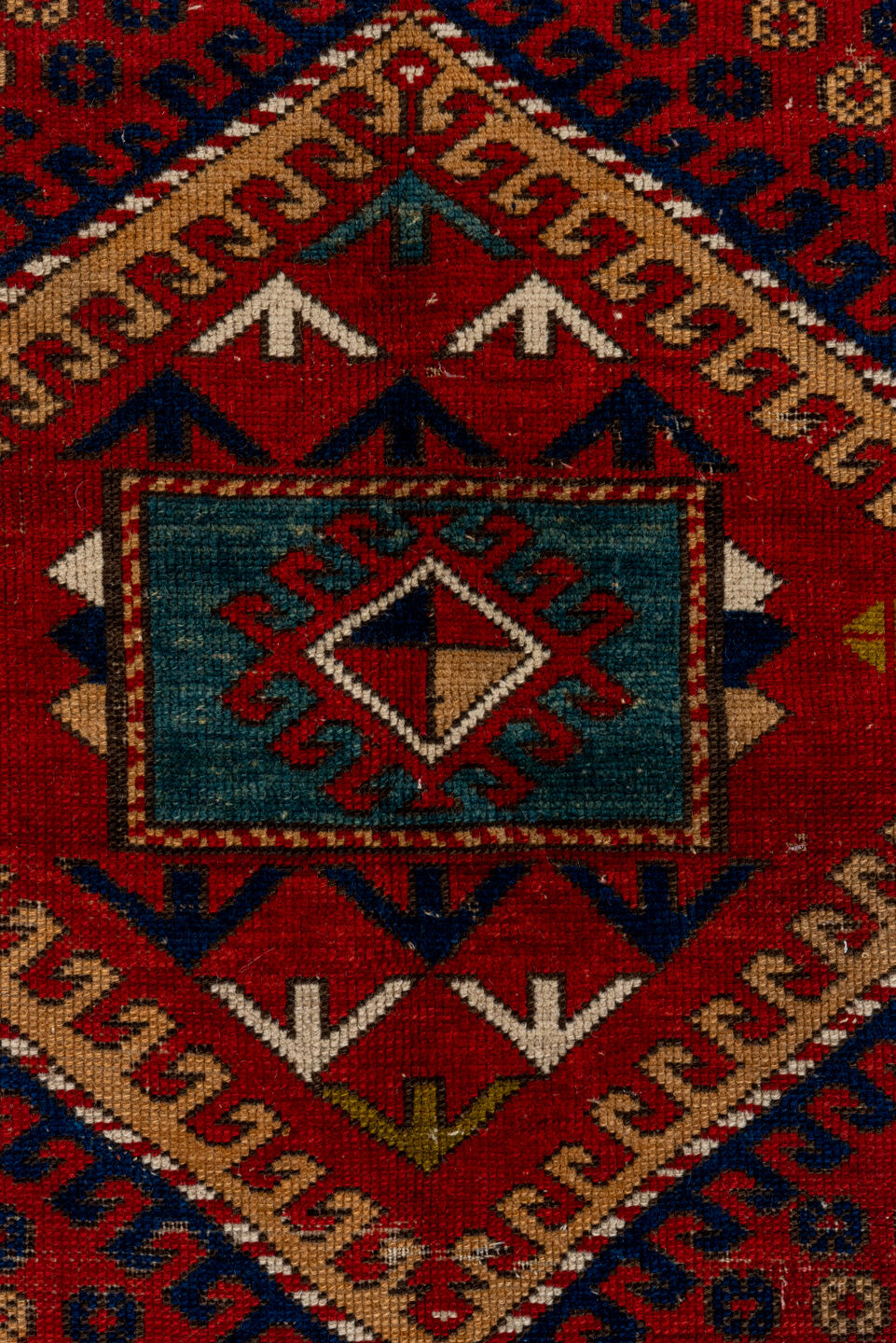 5' x 7' one-of-a-kind handmade vintage Kazak rug. Color palette: red, ivory, navy, olive, gold, rust, sky_blue, brown, blue