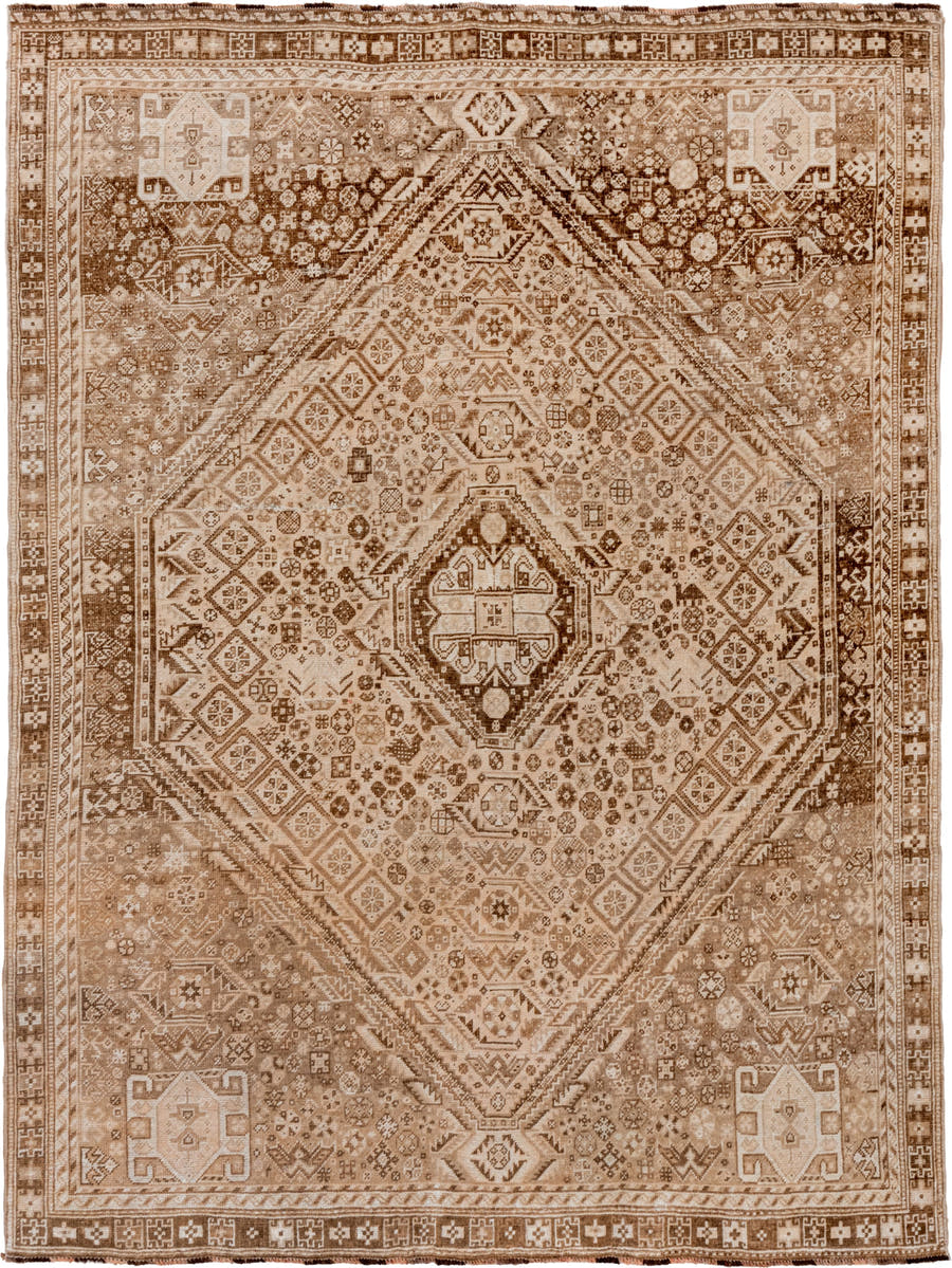 7' x 9' one-of-a-kind handmade vintage Shiraz rug. Color palette: camel, ivory, taupe, brown, sand, beige, gray