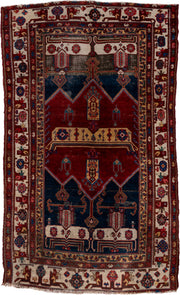 4' x 7' one-of-a-kind handmade antique Malayer rug. Color palette: crimson, navy, ivory, burgundy, camel, cobalt, taupe, red