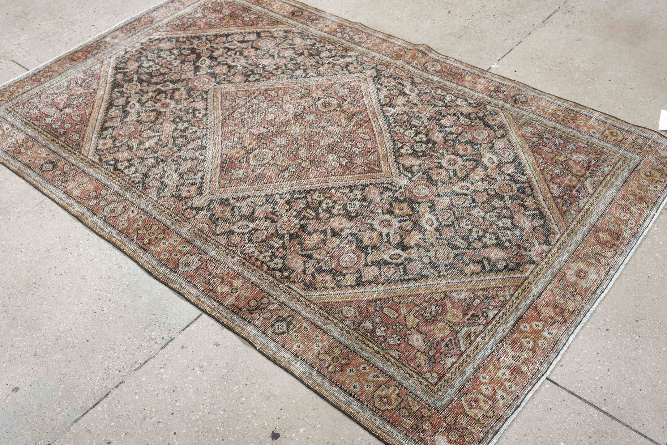4' x 6' one-of-a-kind handmade vintage Mahal small size rug. Color palette: terra cotta, charcoal, ivory, rose, gold, taupe