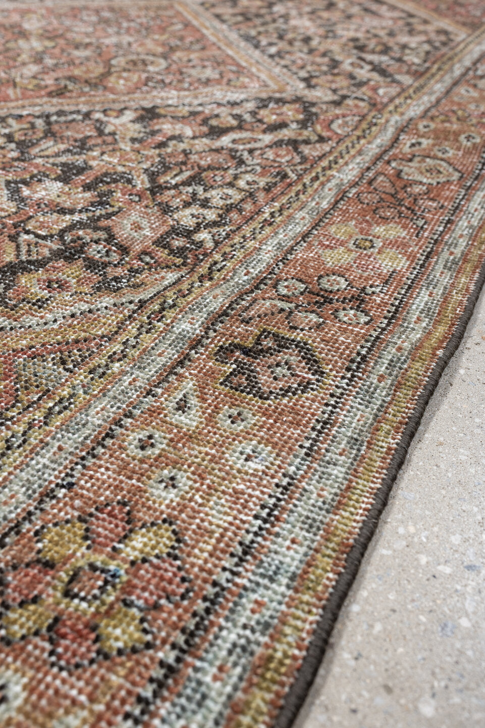 4' x 6' one-of-a-kind handmade vintage Mahal small size rug. Color palette: terra cotta, charcoal, ivory, rose, gold, taupe