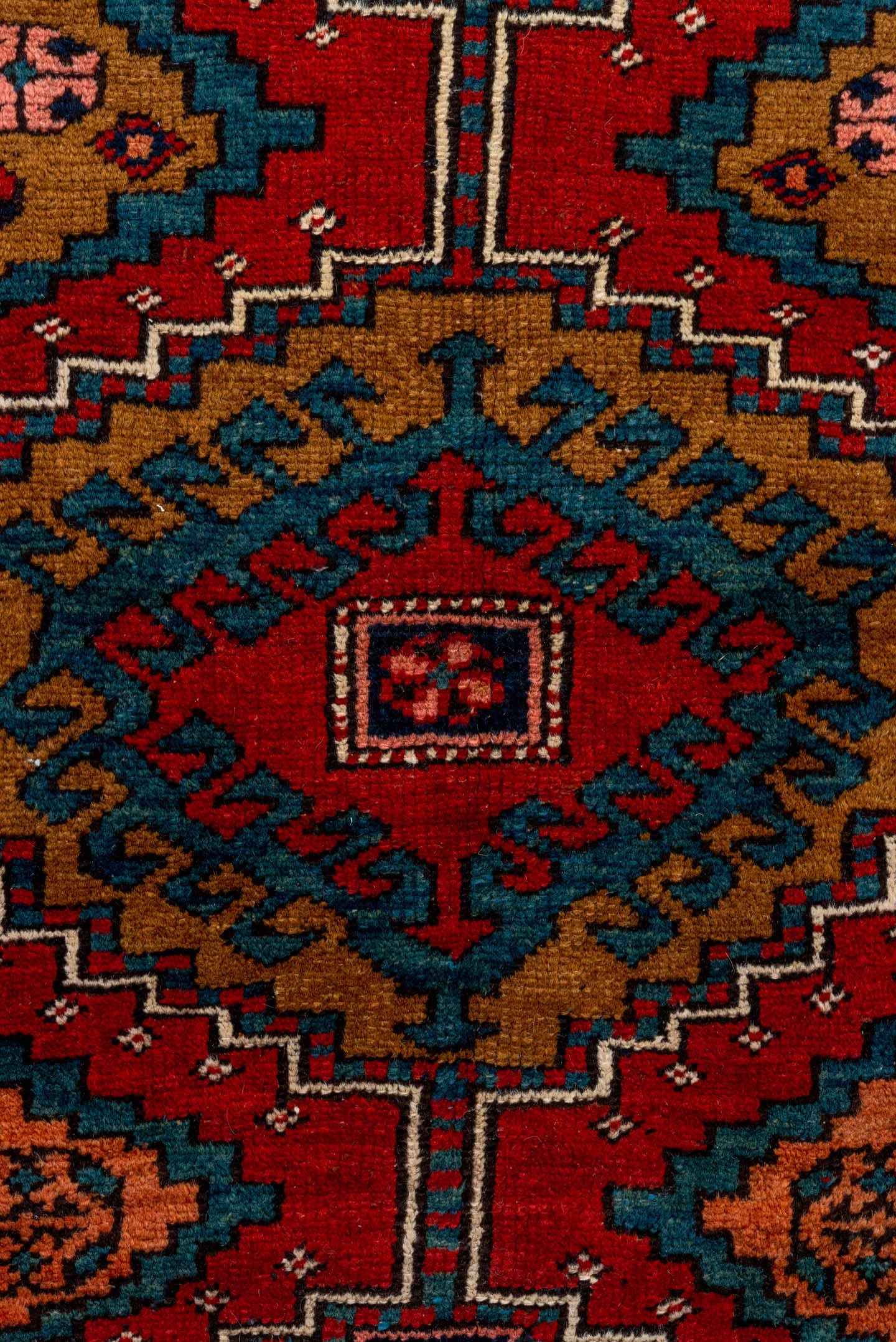 3' x 12' one-of-a-kind handmade vintage Heriz runner rug. Color palette: rust, navy, terra cotta, camel, ivory, teal, rose
