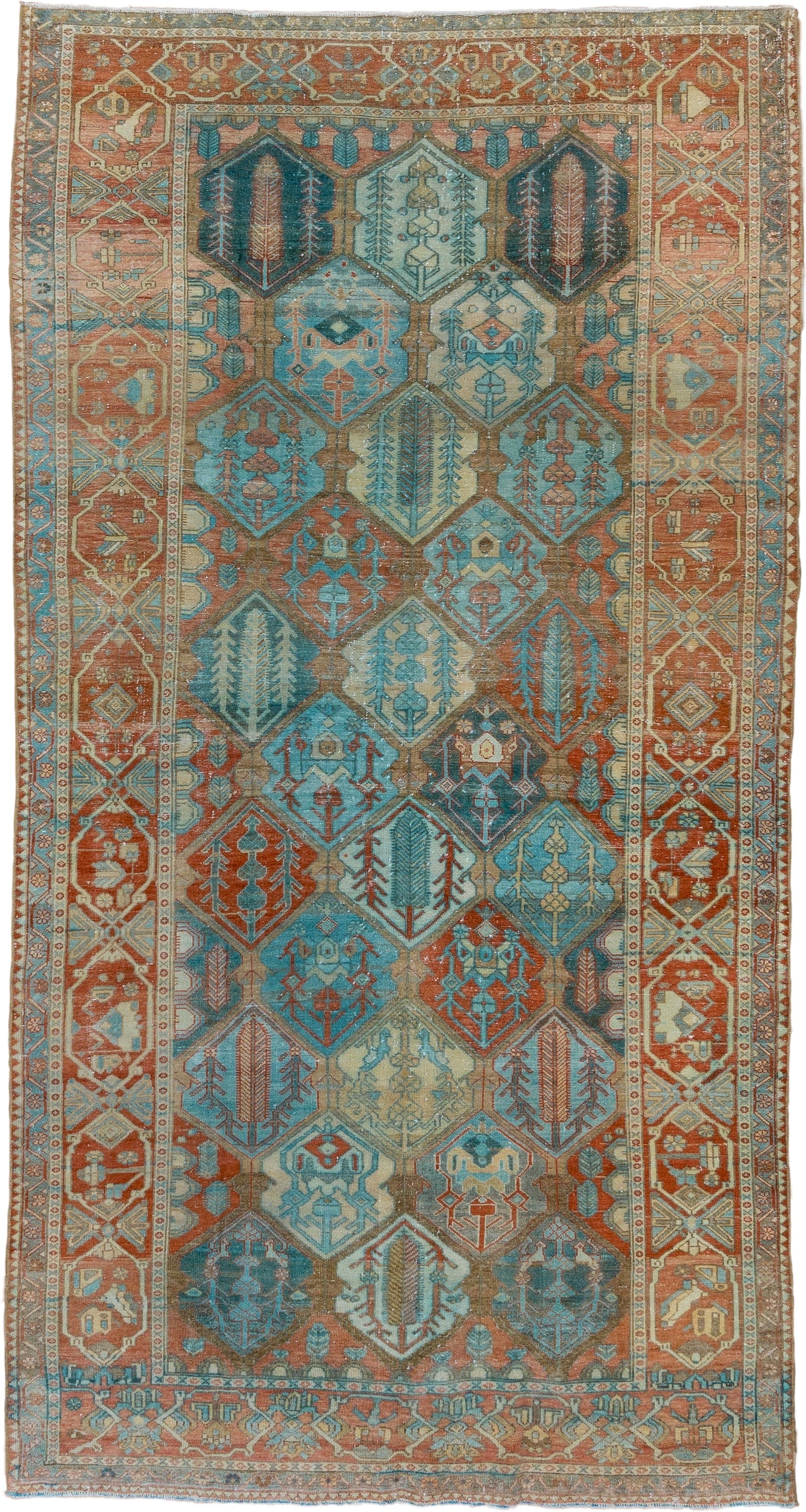 5' x 10' one-of-a-kind handmade vintage Baktiary runner rug. Color palette: rust, sky blue, ivory, camel, teal, terra cotta