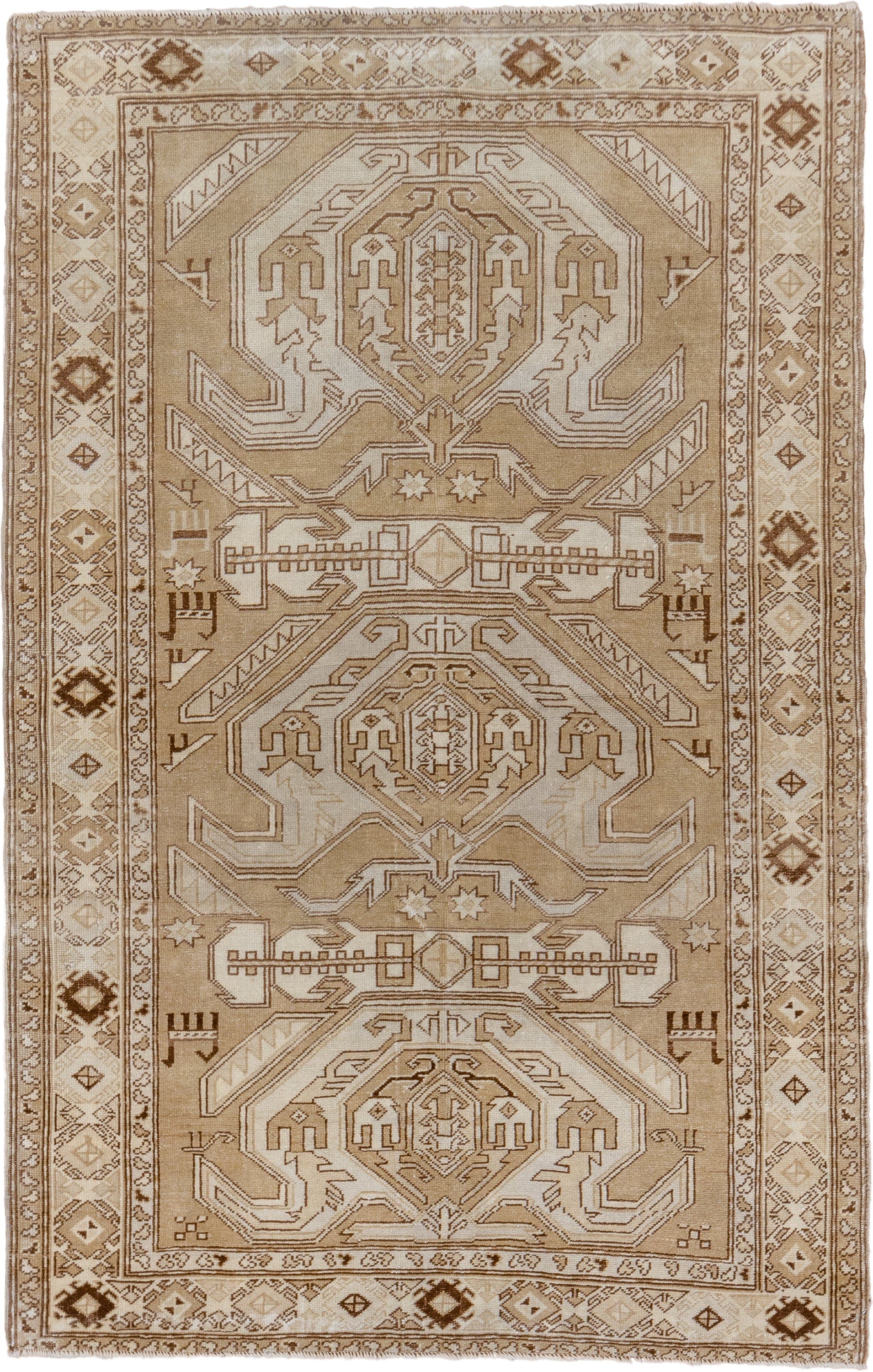 4' x 6' one-of-a-kind handmade vintage Caucasian small size rug. Color palette: ivory, camel, taupe, brown, sand, beige