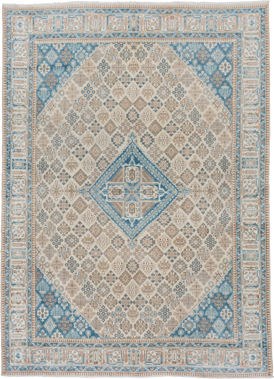 7' x 11' one-of-a-kind handmade vintage Joshegan large size rug. Color palette: ivory, sky blue, taupe, beige, camel